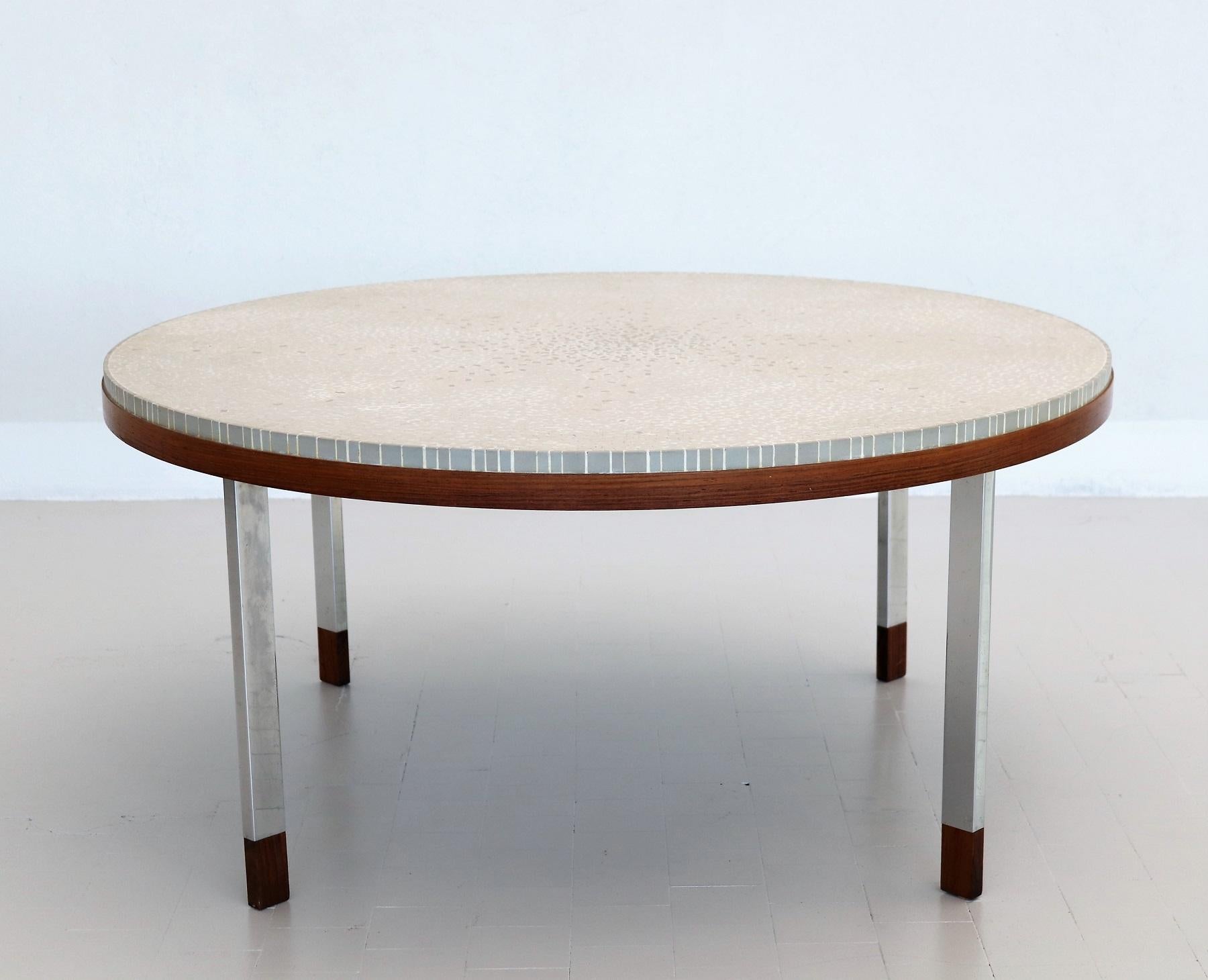 Gorgeous coffee table with big Mosaic plate with white-off and grey tiles on strong teak table base.
Made in Germany in the 1960s by Berthold Müller, Oerlighausen.
The Mosaic as well as the teak base are in original very good condition with small