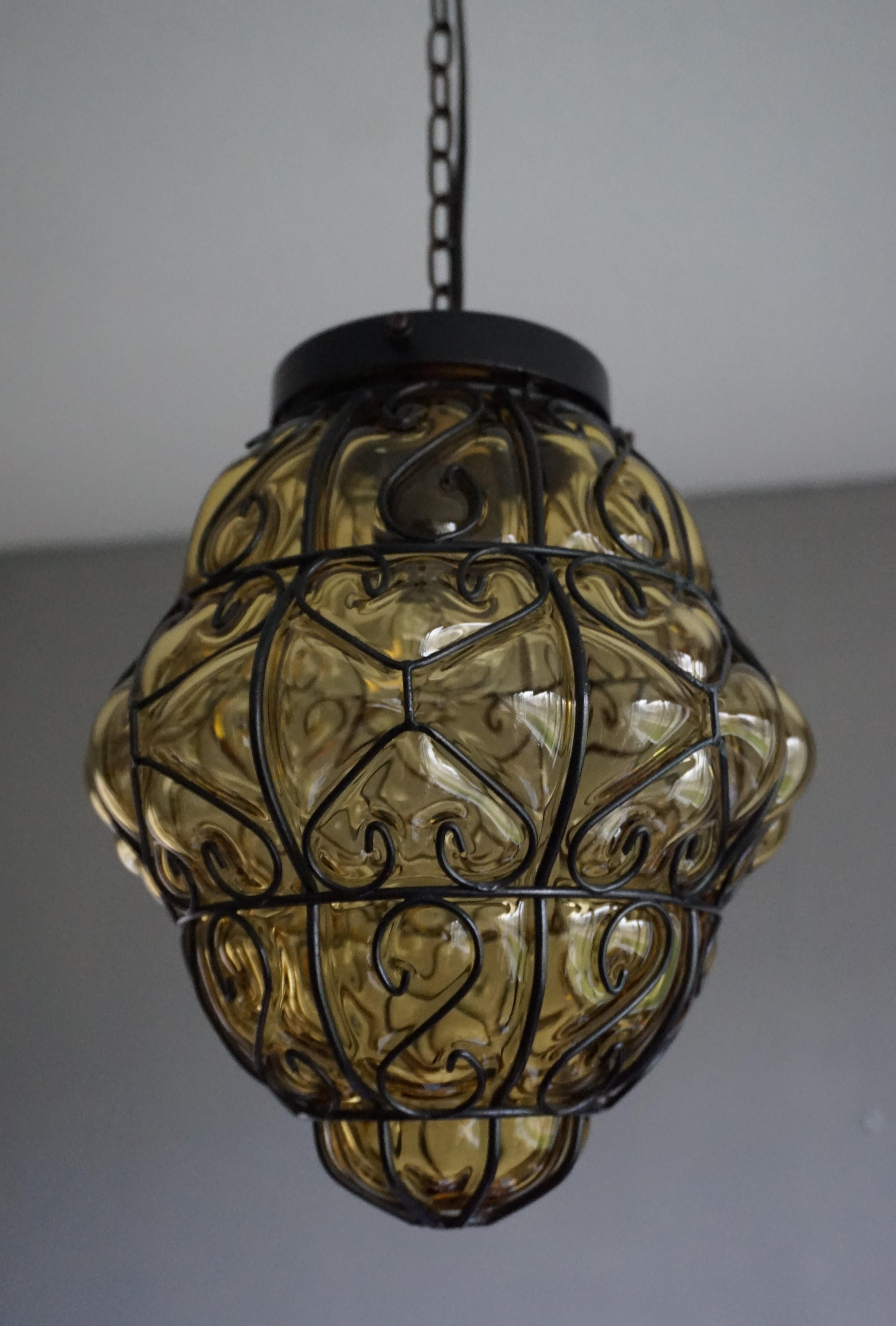 Midcentury Mouth Blown Amber Glass in Wrought Iron Frame Pendant Light Fixture 1