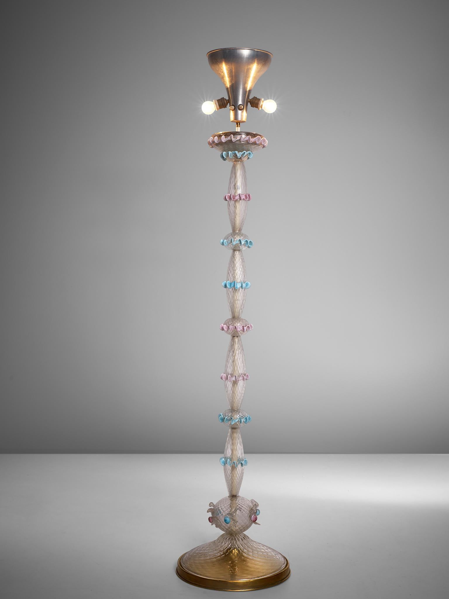 Floor lamp, Murano glass and brass, Italy, 1950s-1960s.

Handcrafted Midcentury floor lamp in clear Murano glass, decorated with several pastel colored, glass wrinkled ornaments. The clear glass base is build up from hourglass shaped elements that