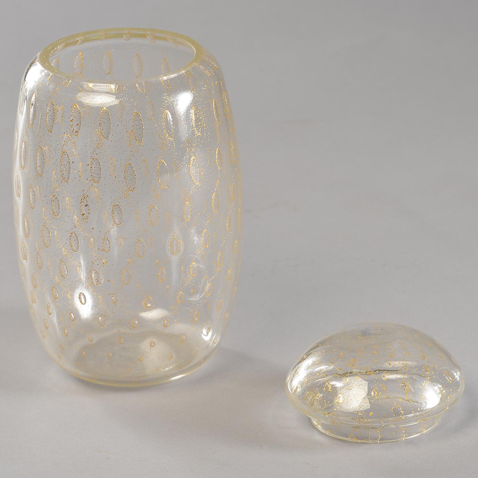 Clear Murano glass vessel has gold inclusions and a lid, circa 1950s. Other similar vessels in other sizes and shapes available at the time of the this posting.