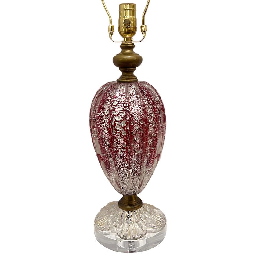A circa 1950's Italian blown glass red lamp.

Measurements:
Height of body: 15.5