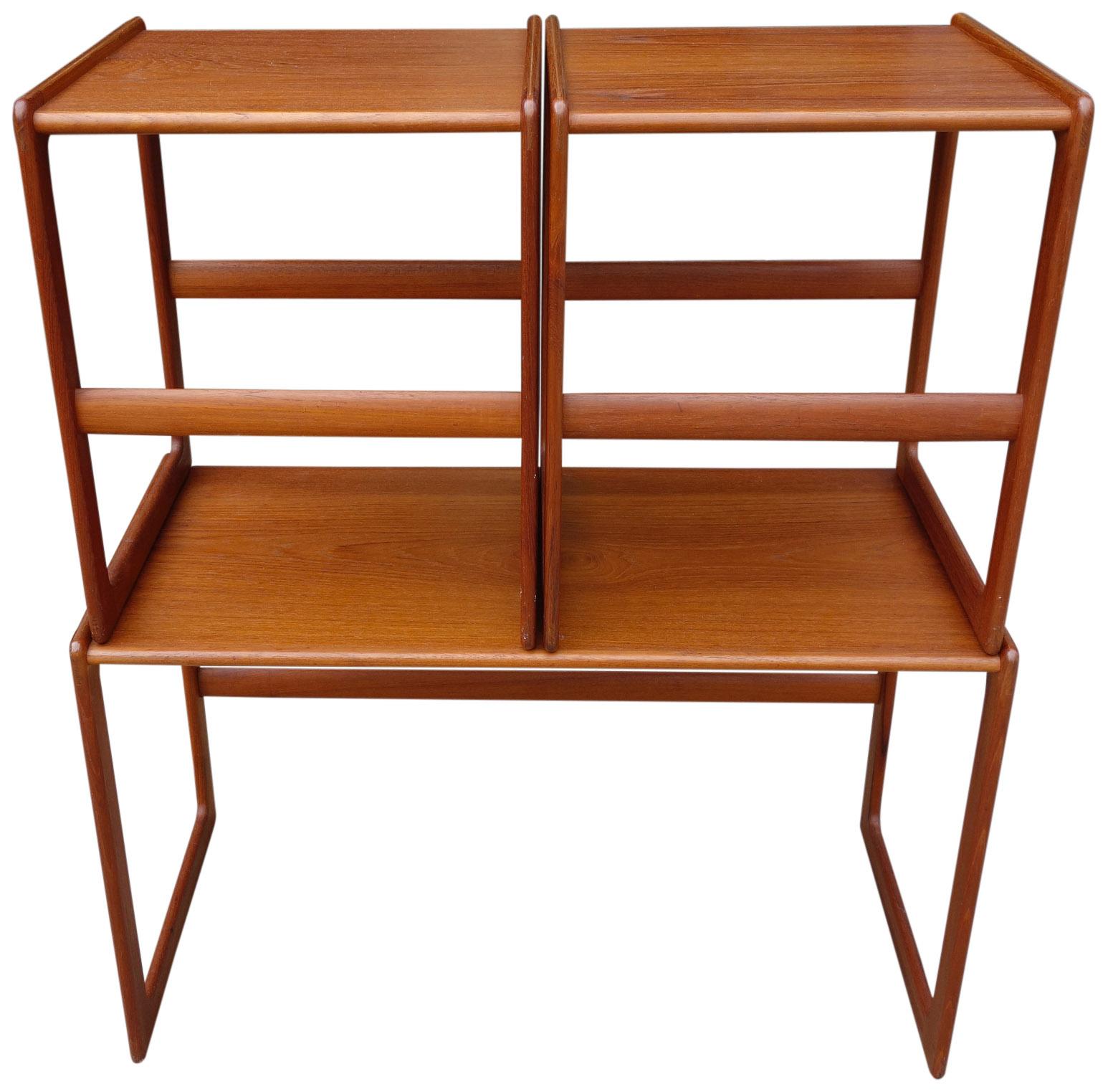 For you consideration is this wonderful set of nesting tables in teak wood. Minimal to the eye with complex joinery, these multifunctional tables are a perfect addition to your midcentury home. 

In near perfect vintage condition seeing very