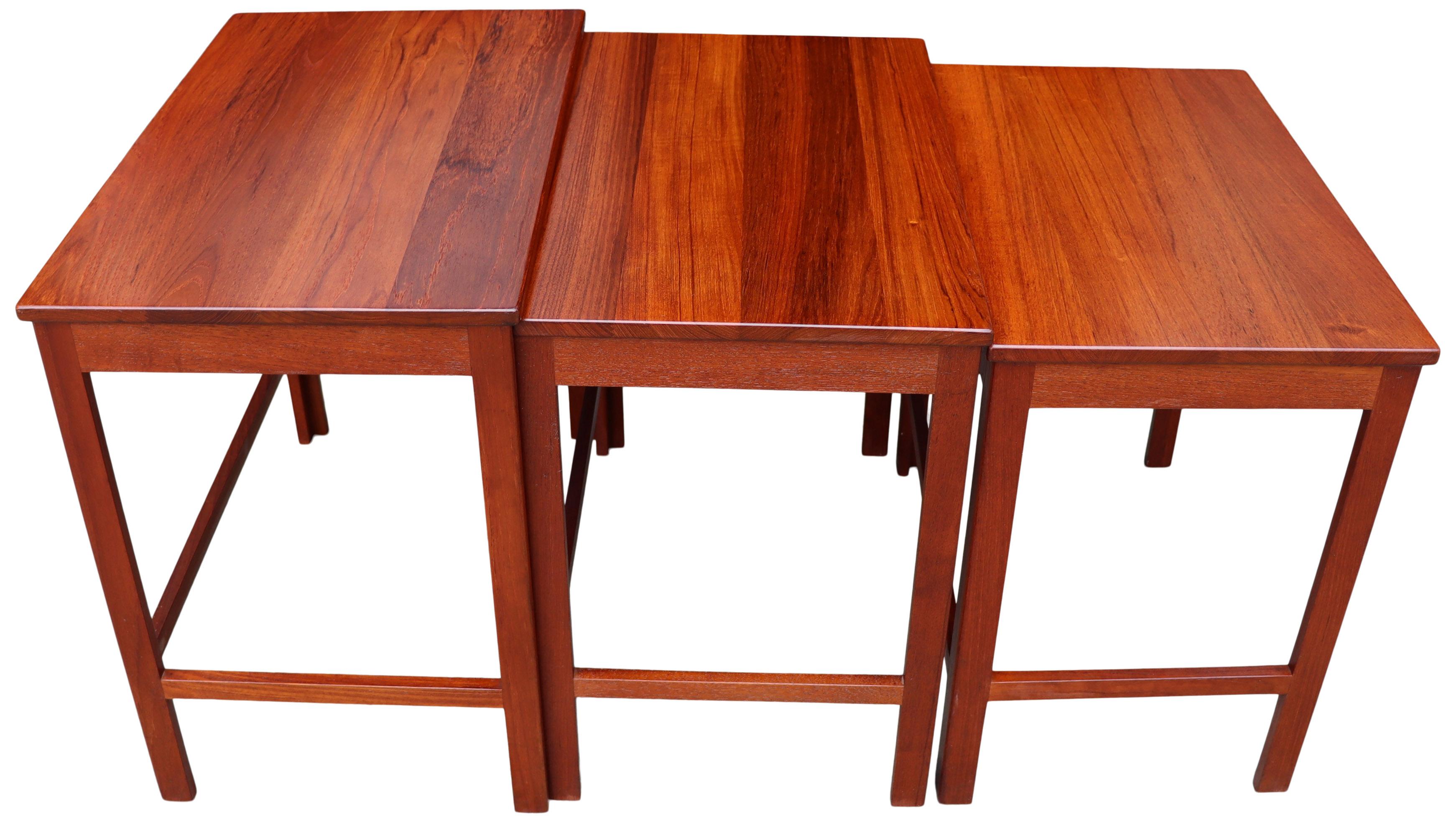 Set of 3 Danish Scandinavian nesting tables by Peter Hvidt Orla Molgaard for France & Daverkosen. Beautiful solid teak wood construction showing very little to no use. Having a wonderful warm patina that teak expresses over time. Labeled FD and a