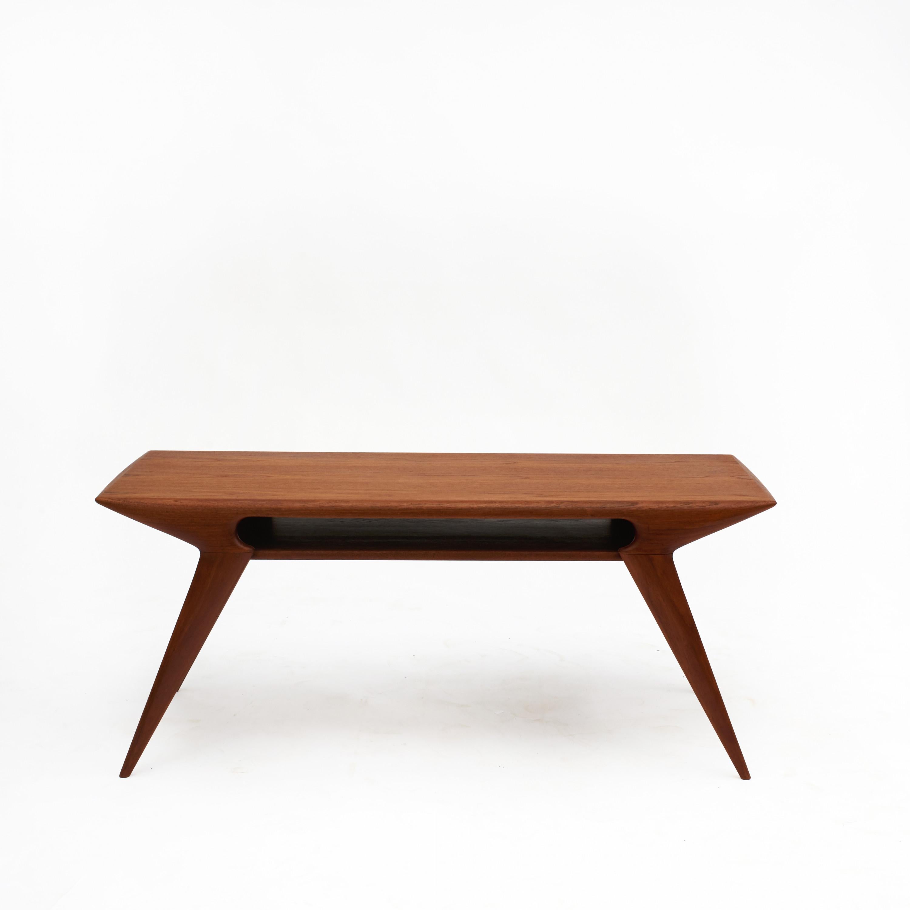Danish solid teak model 34 “Grasshopper” coffee table designed by Niels Otto Møller (1920-1982).
This piece features great Danish craftsmanship. Produced by J.L.M. Møbelfabrik, 1950's.