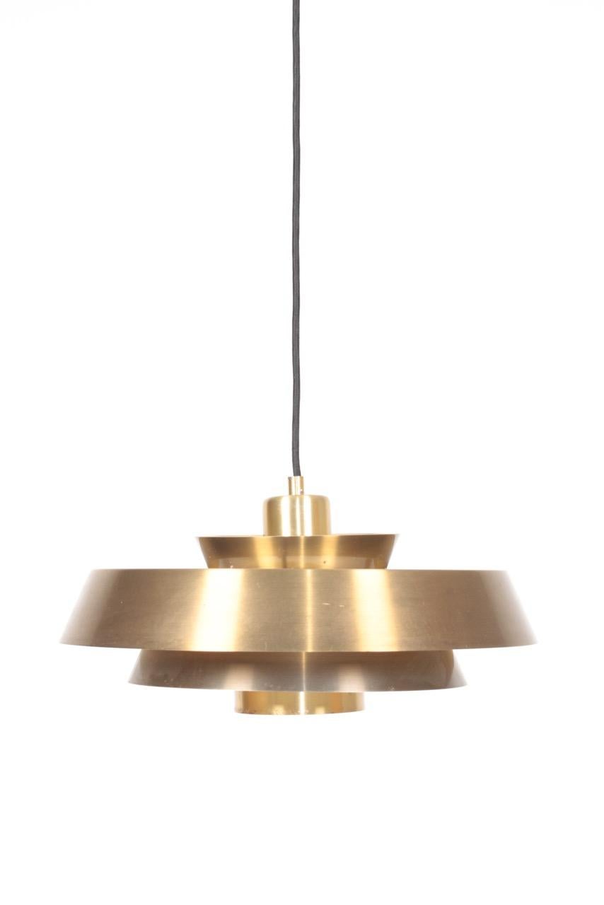 Pendant in patinated brass designed by Jo Hammerborg for Fog & Mørup. Made in Denmark. Great condition.