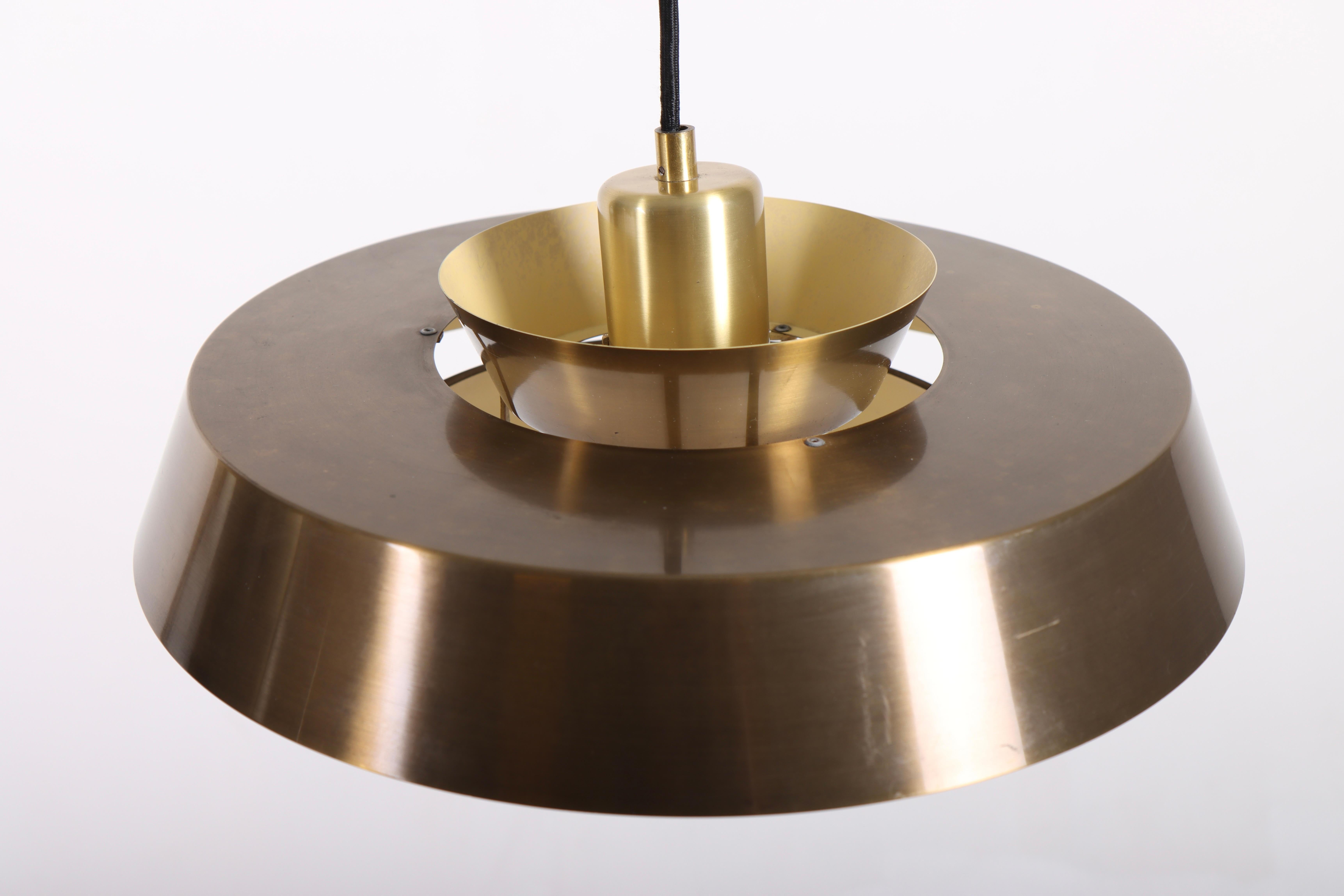 Pendant in patinated brass designed by Jo Hammerborg for Fog & Mørup. Made in Denmark. Great condition.