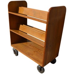 Vintage Midcentury Oak Book Cart with slanted Shelves on Wheels from Public Library