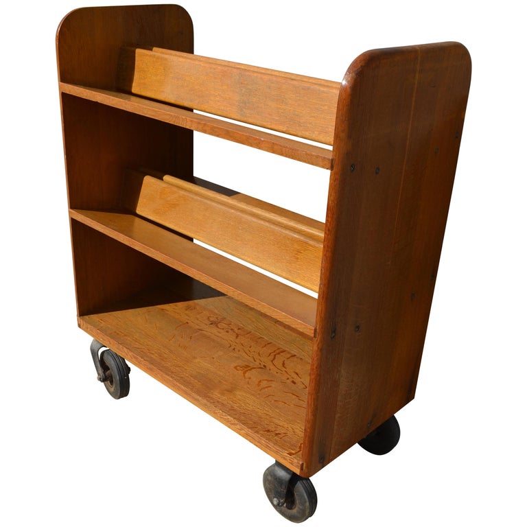 Midcentury Oak Book Cart with slanted Shelves on Wheels from Public Library  at 1stDibs | wooden book cart on wheels, vintage library book cart, vintage  library cart