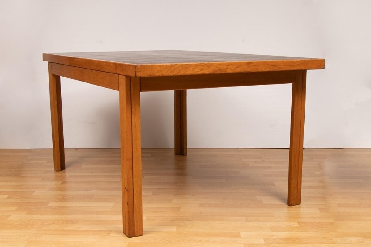 A midcentury oak table/desk with rexine top.