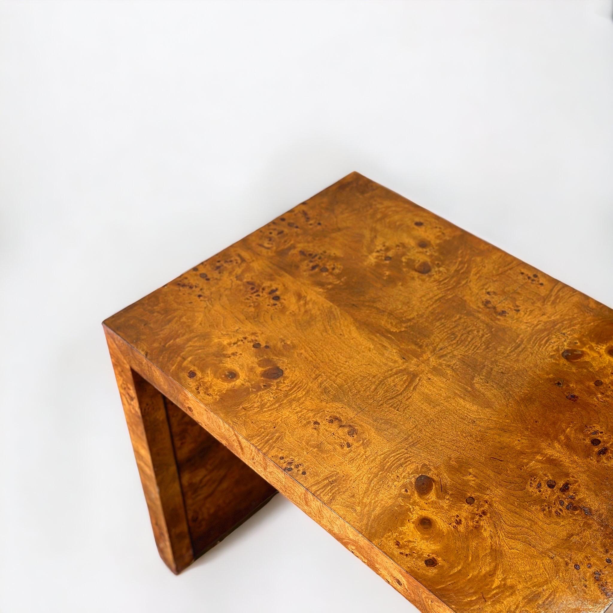 Mid-Century Modern waterfall Parsons style occasional table in burled olive wood, after Milo Baughman. Clean modern lines juxtaposed with the organic free flowing burl. Each table leg rests on .5