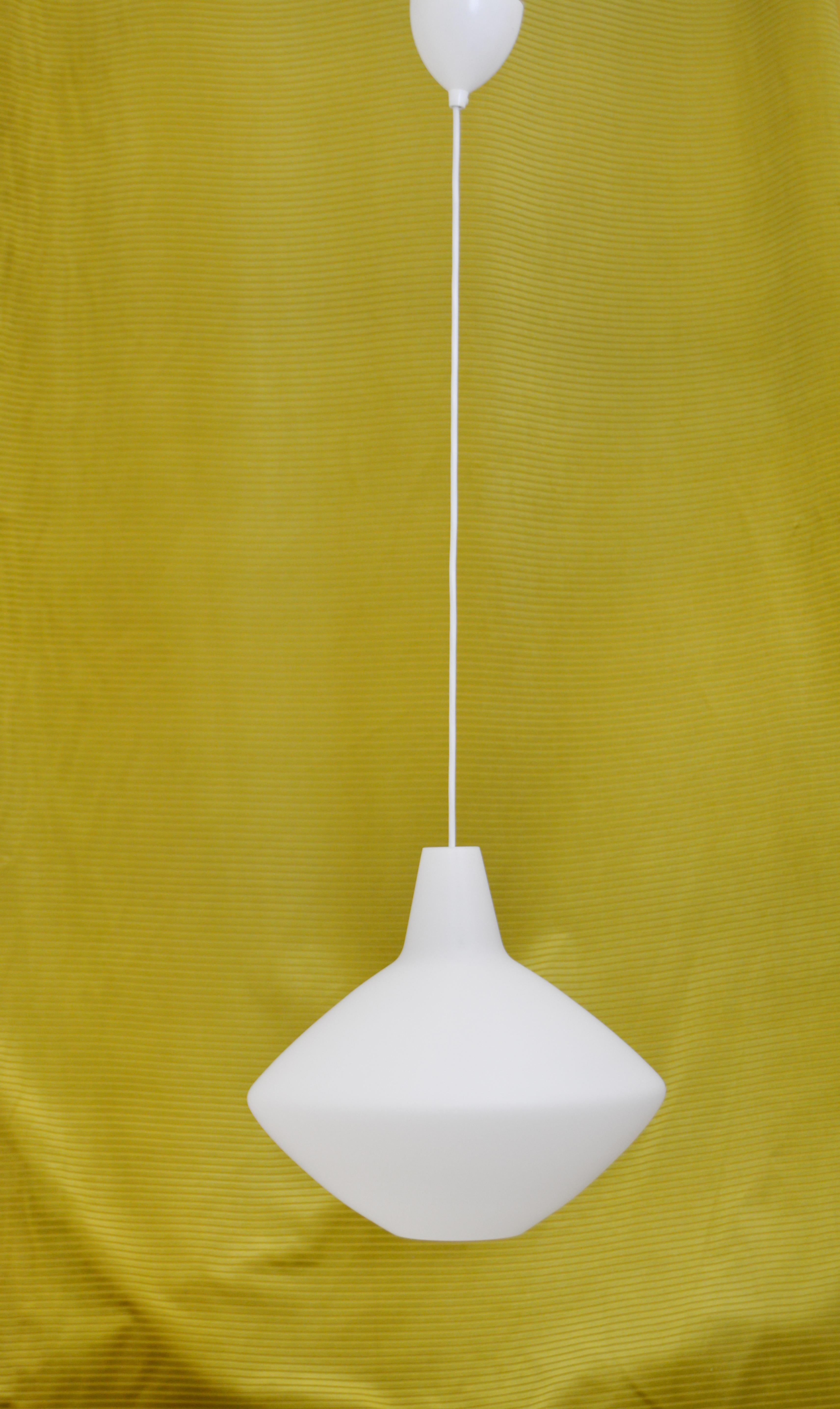 This lamp is made in the mid-20 century. It's designed by Lisa Johansson Pape and produced for ASEA in Sweden.

Scandinavian Modern period. Excellent vintage condition.
 