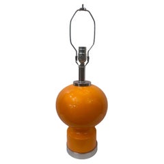 Lampada in vetro arancione del Medioevo