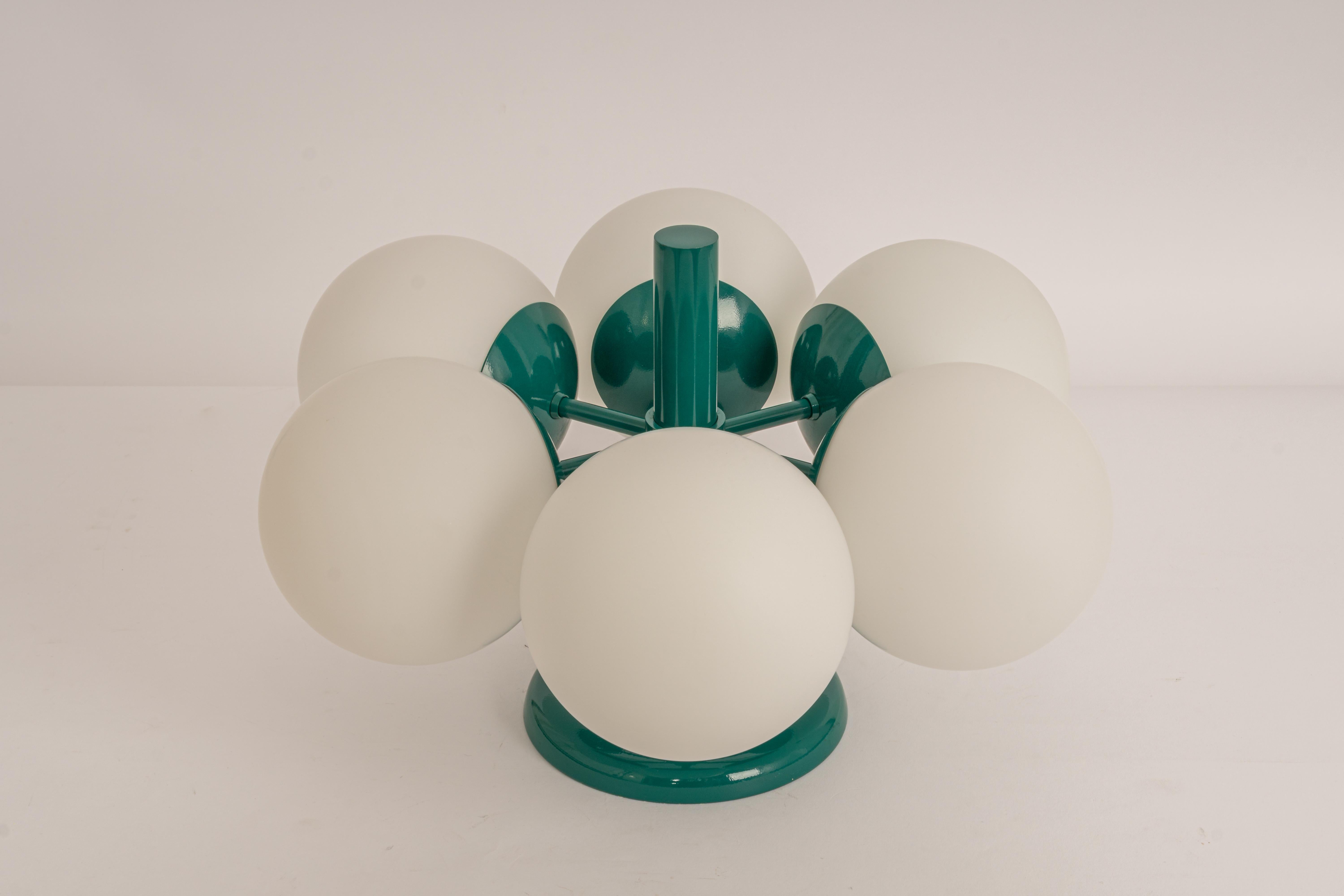 Midcentury vintage ceiling or wall light in green color made by Kaiser Leuchten, Germany with 6 opal glass balls.
High quality and in very good condition. Cleaned, well-wired, and ready to use. 

The fixture requires 6 x E14 small bulbs with 40W