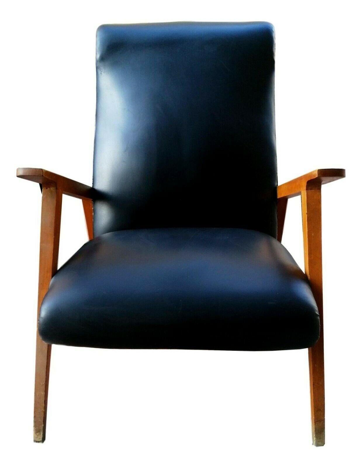 Splendid armchair of original 1960s design, with solid wood structure and black skay upholstery

Available on request the entire living room consisting of two identical armchairs and a sofa, same style

Photo on request

The chair is in