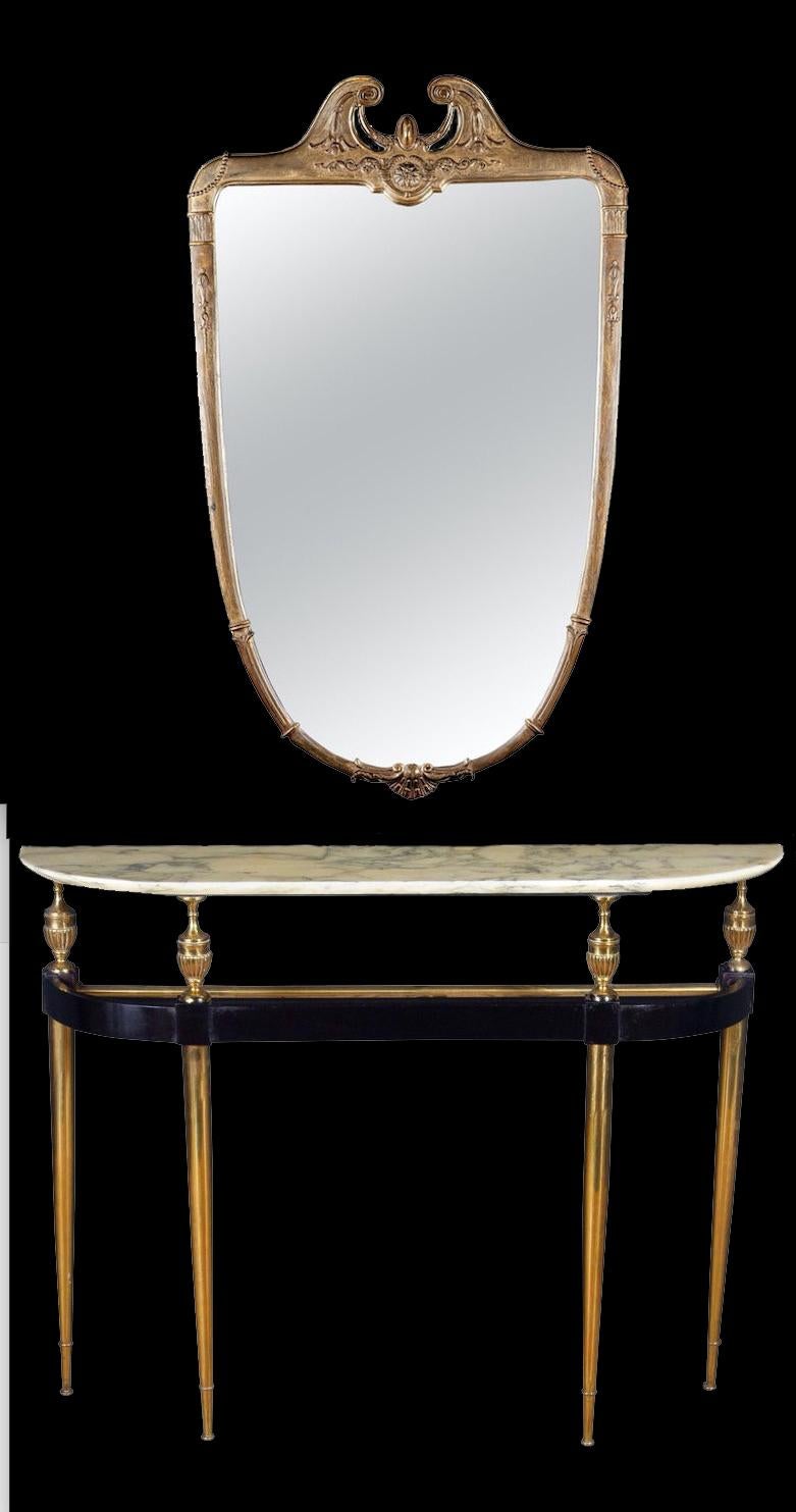 Elegant Italian midcentury gilt bronze console table with a veneered marble top.
Finely chiseled bronze decoration.
Attributed to Paolo Buffa.