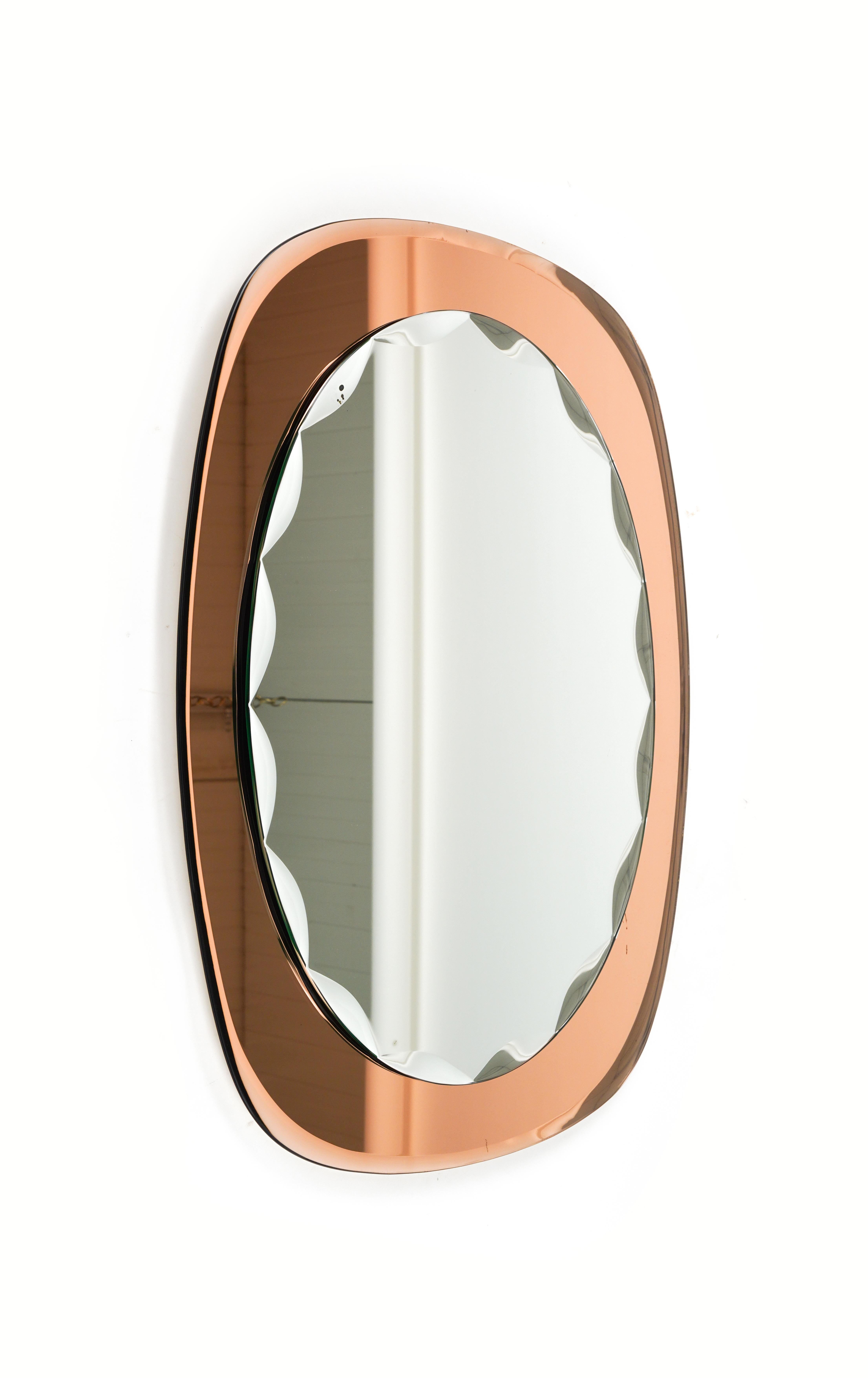 Italian Midcentury Oval Wall Mirror rose gold Glass Frame by Cristal Arte, Italy 1960s For Sale