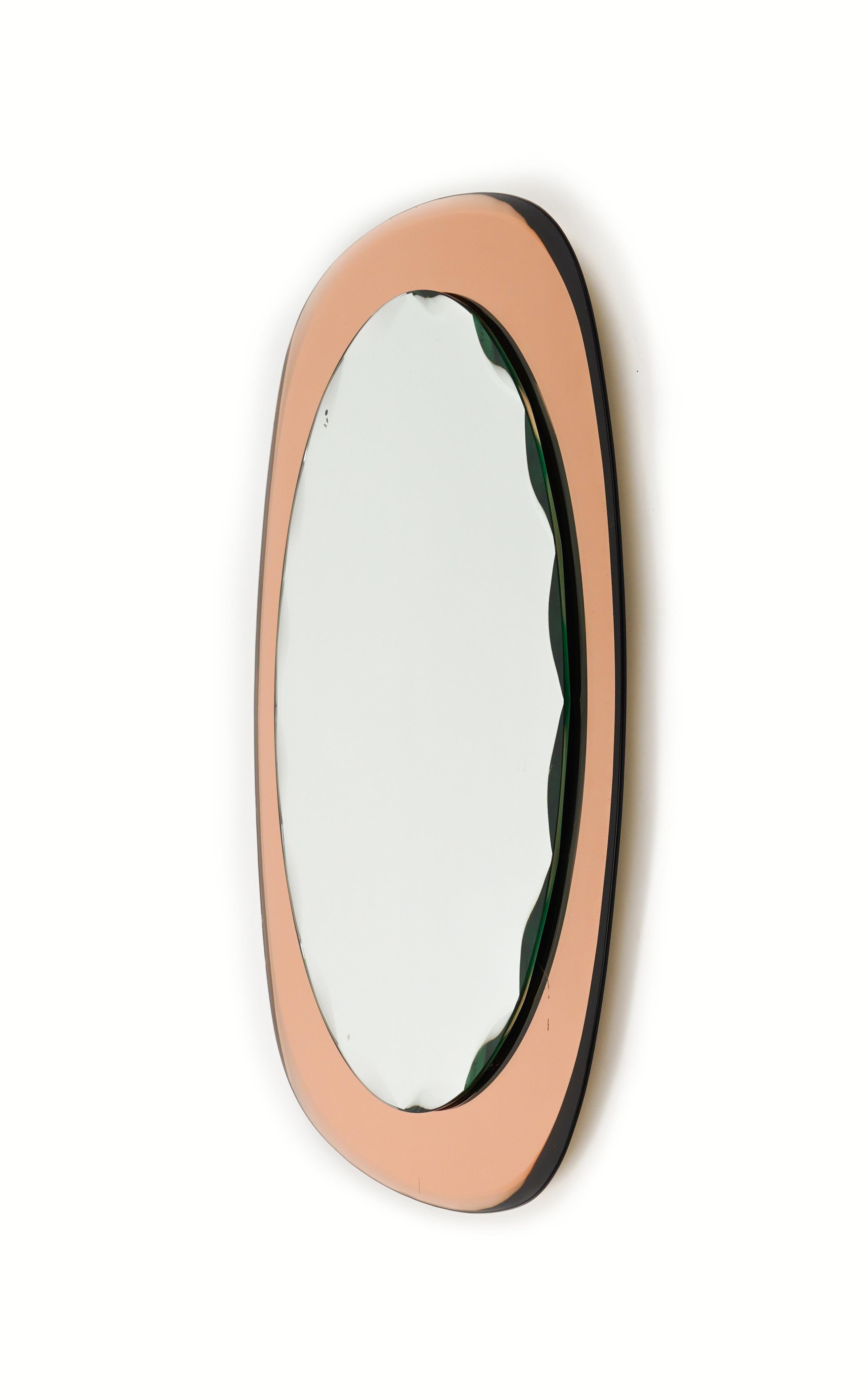 Metal Midcentury Oval Wall Mirror rose gold Glass Frame by Cristal Arte, Italy 1960s For Sale