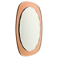 Vintage Midcentury Oval Wall Mirror rose gold Glass Frame by Cristal Arte, Italy 1960s