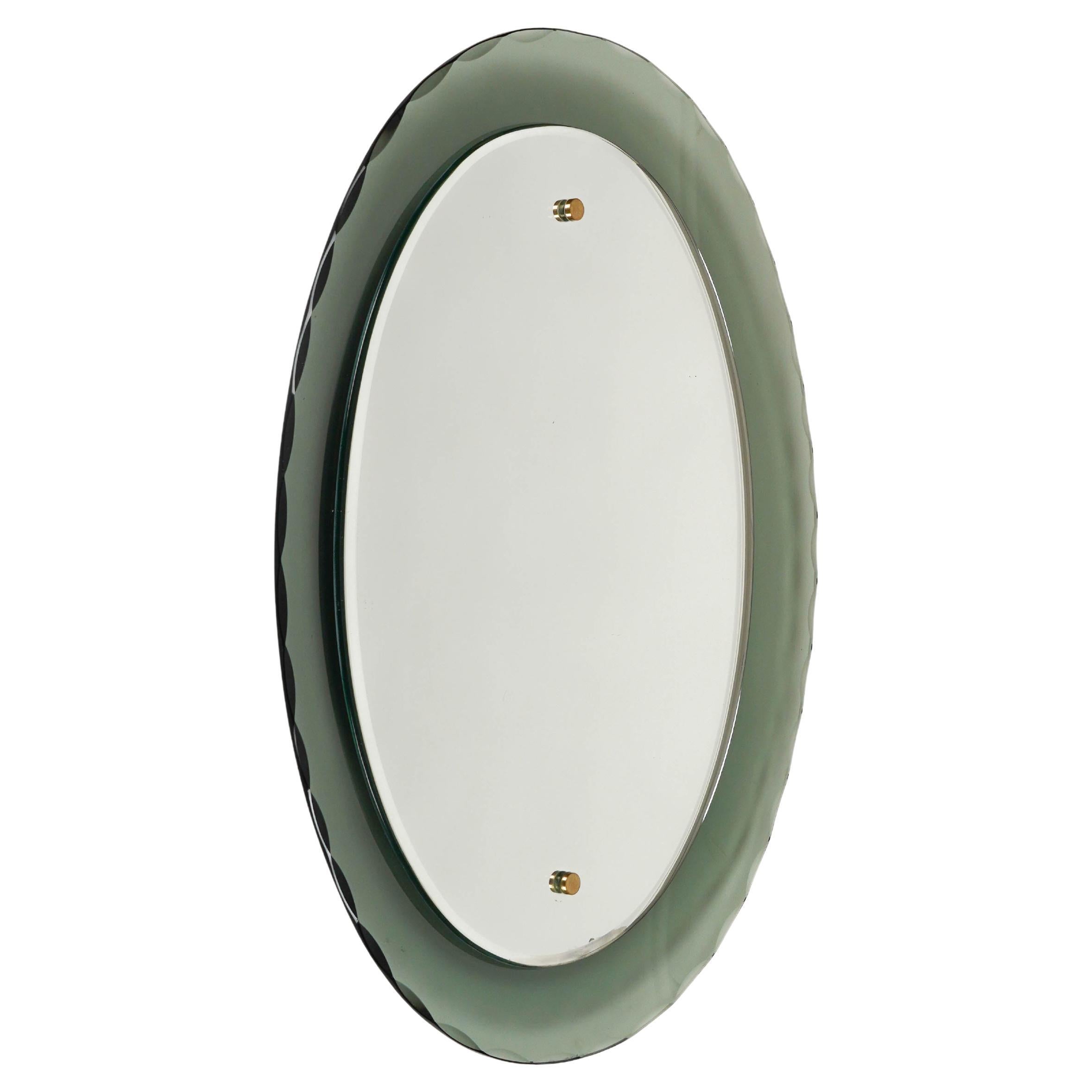 Midcentury Oval Wall Mirror whit Smoked Glass Frame by Cristal Arte, Italy 1960s For Sale