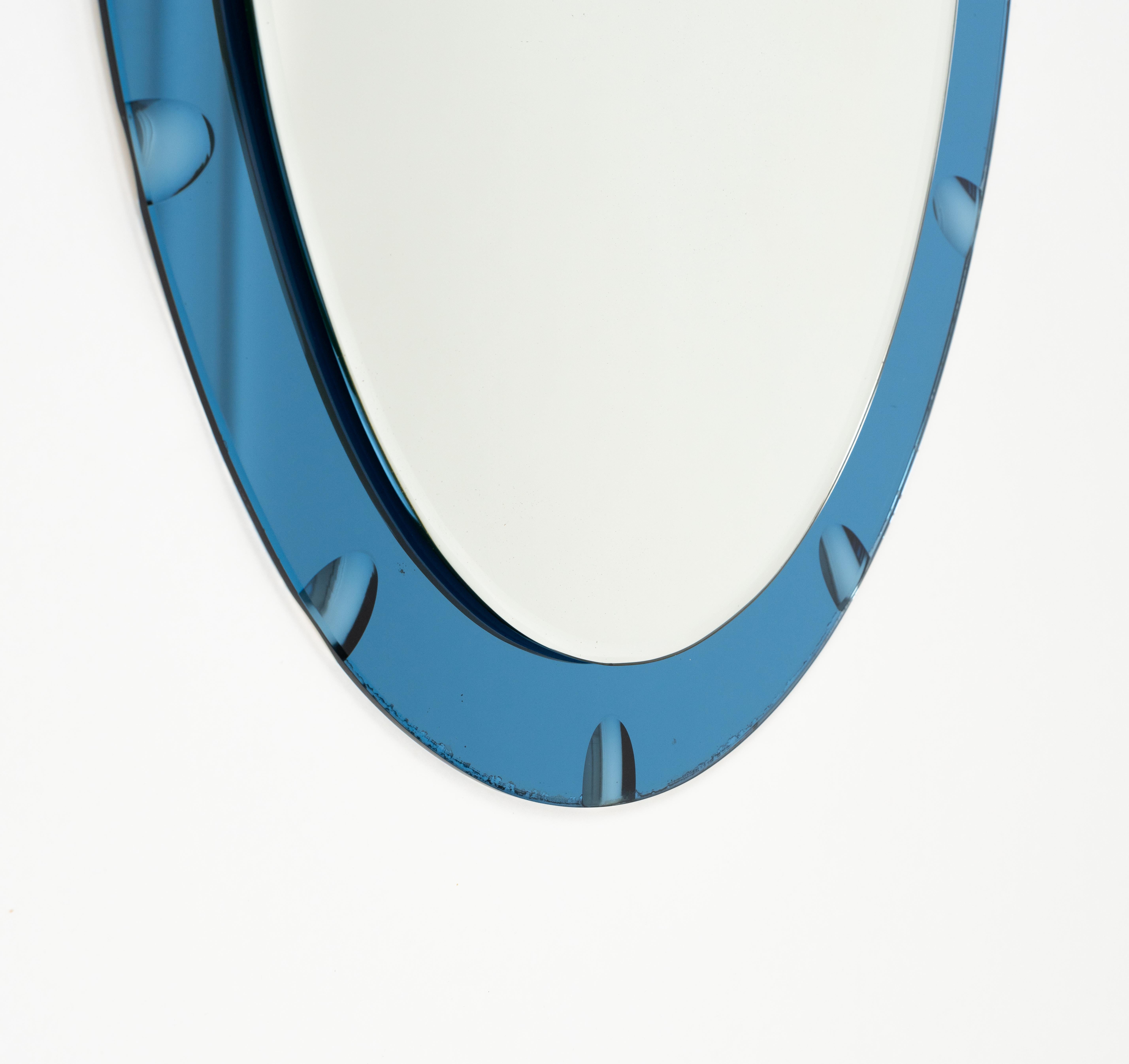 Late 20th Century Midcentury Oval Wall Mirror with Blue Border Cristal Arte Style, Italy 1970s For Sale