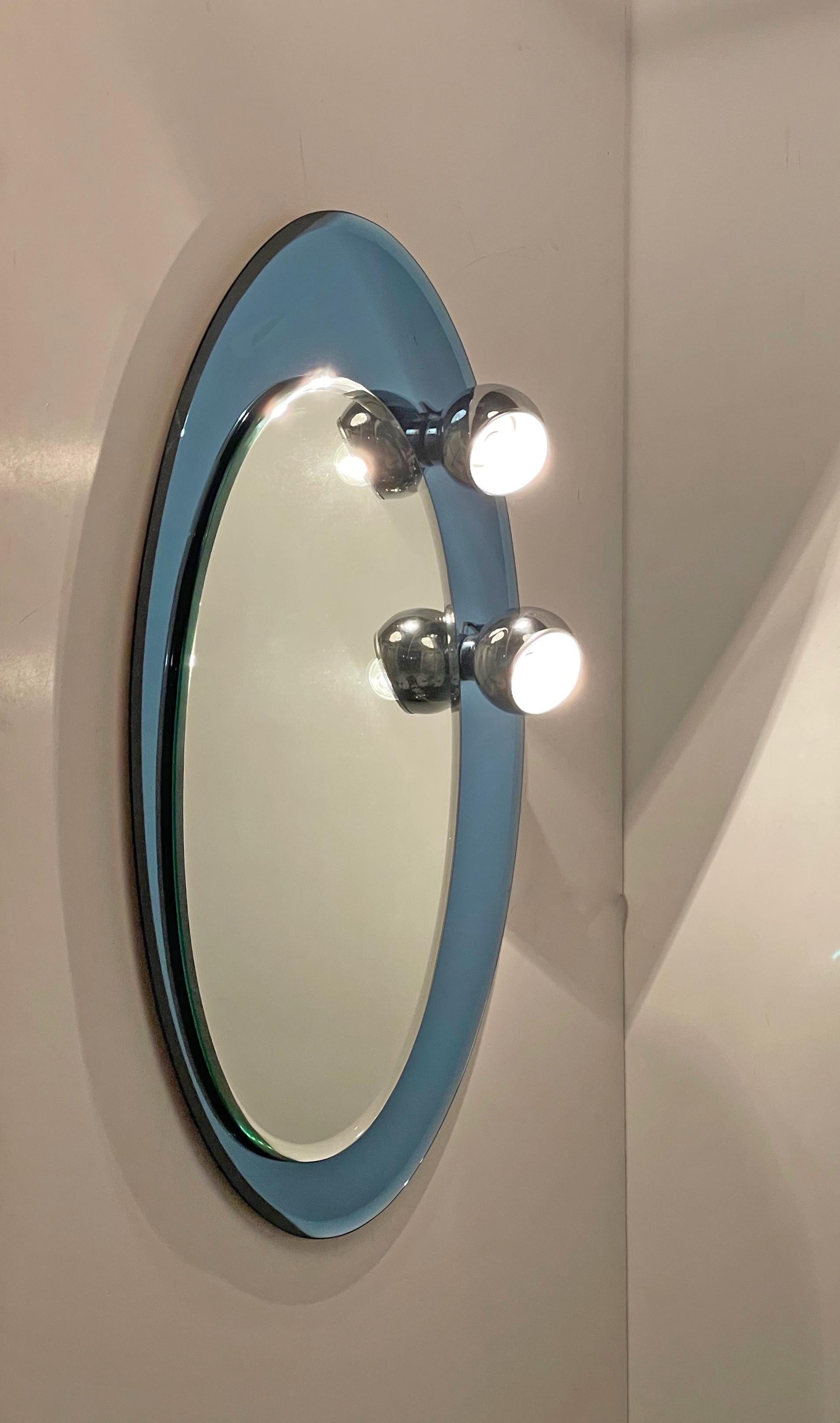Midcentury Oval Wall Mirror with Blue Glass Frame and Magnetic Lights Italy 1960 For Sale 4