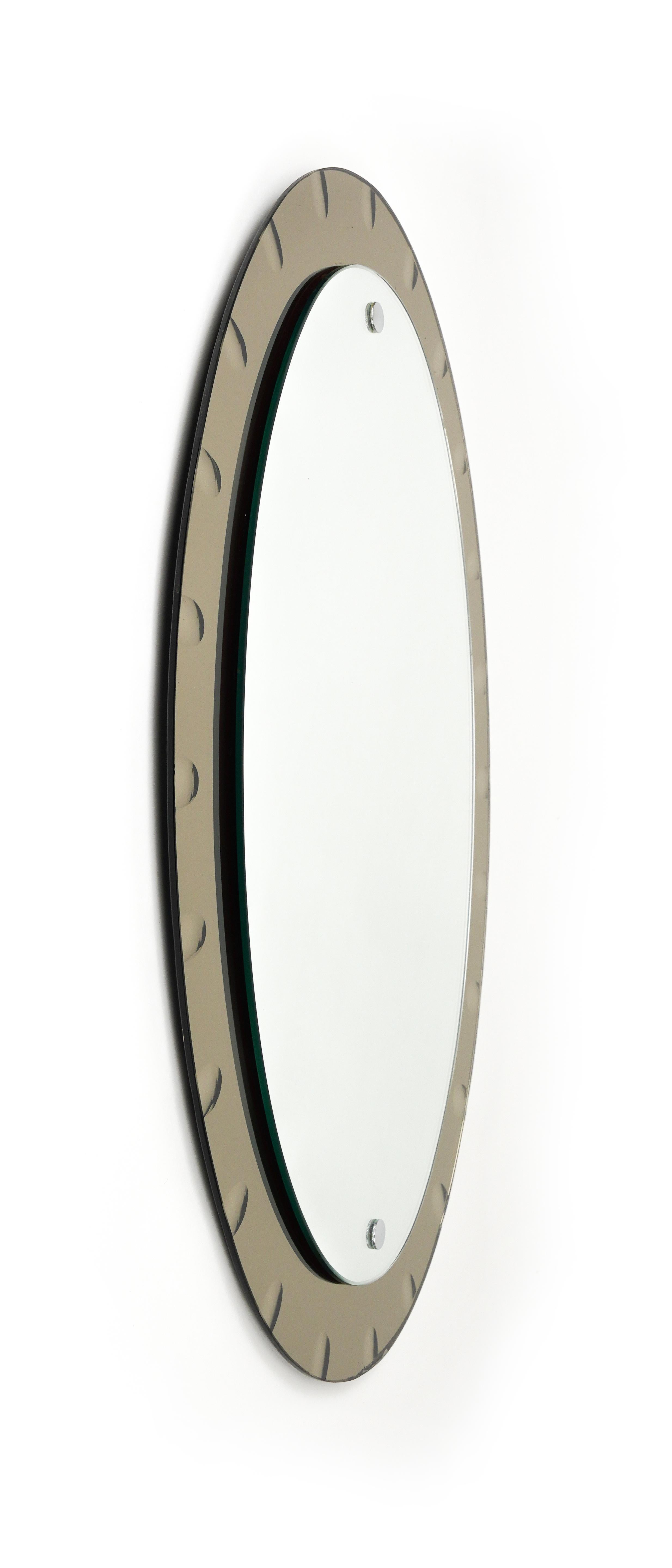 Italian Midcentury Oval Wall Mirror with Bronzed Frame by Cristal Arte, Italy 1960s For Sale