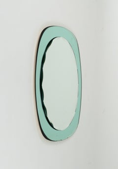 Specchio da parete ovale del Medioevo con cornice verde in stile Cristal Arte, Italia 1960s