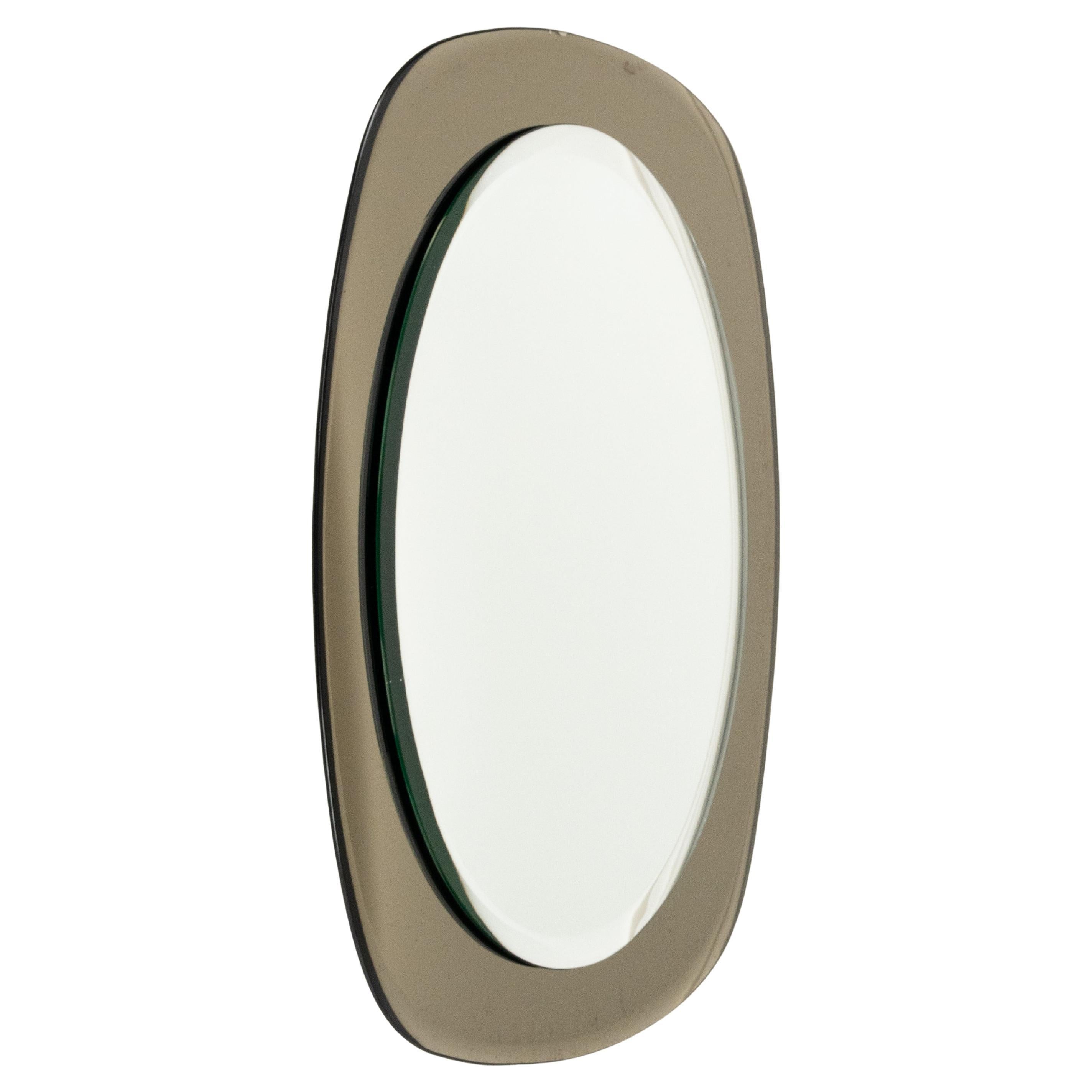 Midcentury Oval Wall Mirror with Smoked Frame Cristal Arte Style, Italy 1960s
