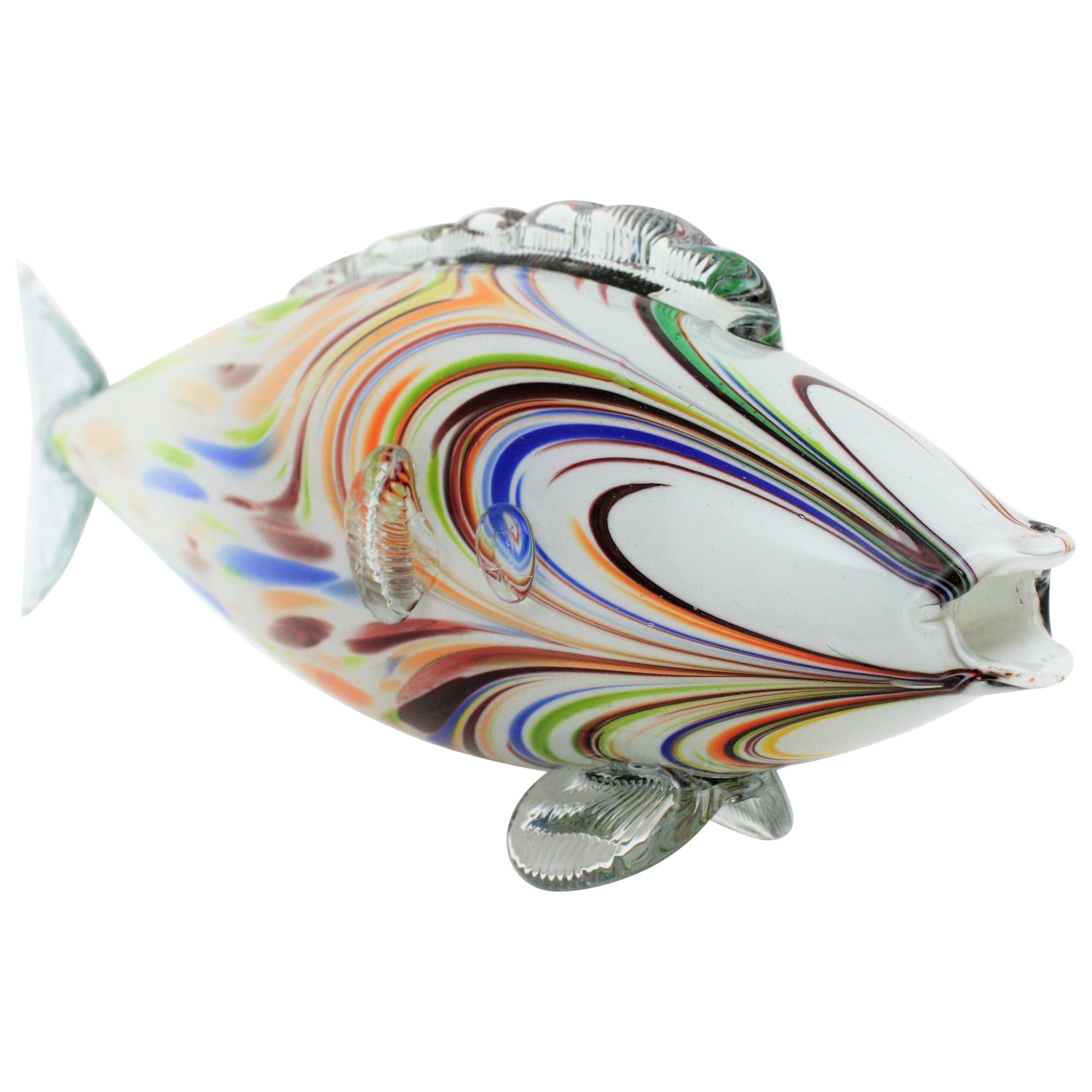 Huge Italian Murano glass hand blown fish figure with colorful decorative spots and stripes, Italy, 1950s.
Blue, red, orange, yellow and green accents on a white an clear glass body. Each side of the body has different decoration. 
Excellent