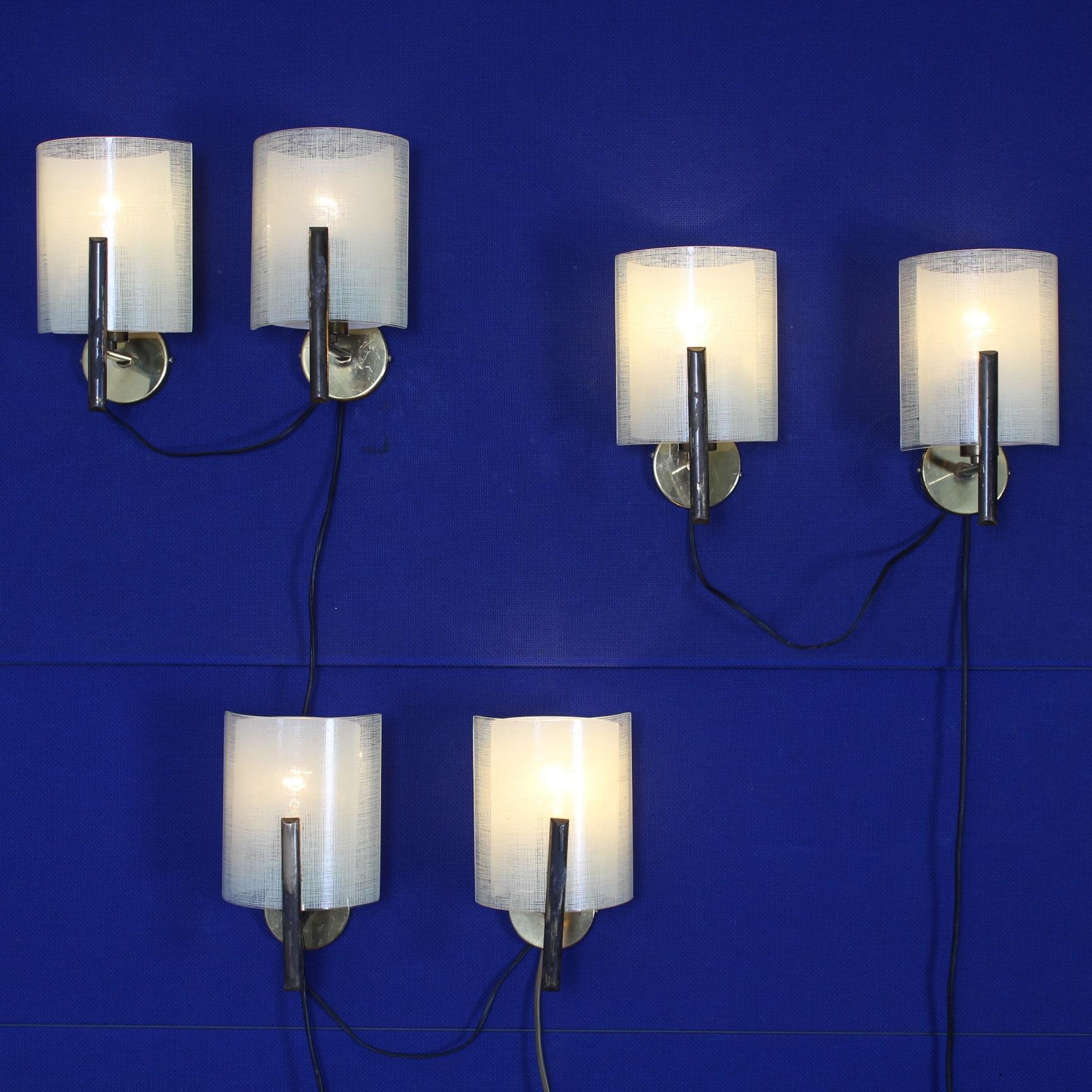Very beautiful of 6 opal glass wall sconces by Stilux Milano.Italy circa 1960.
Wear consistent with age and use.