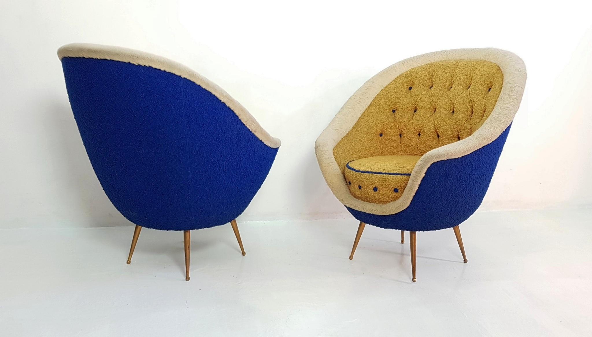 A pair of super elegant Italian armchairs in their original wool fabric in excellent condition produced by ISA Bergamo.
This pair of armchairs comes directly from the original buyer which is how we know the year of production, (1959). The chairs