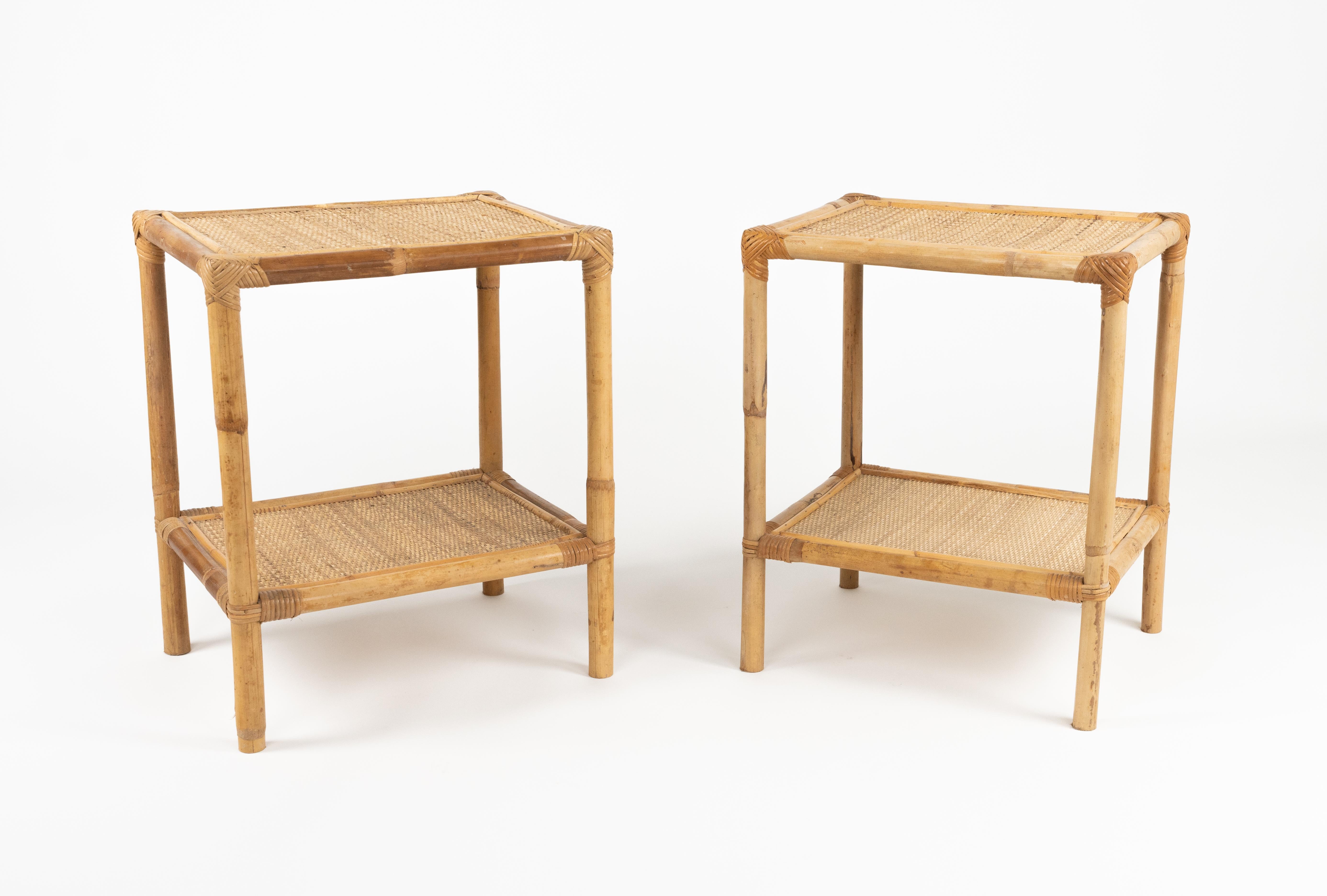 Midcentury beautiful pair of bedside tables or nightstands in bamboo, rattan and wicker.  

Made in Italy in the 1970s.
