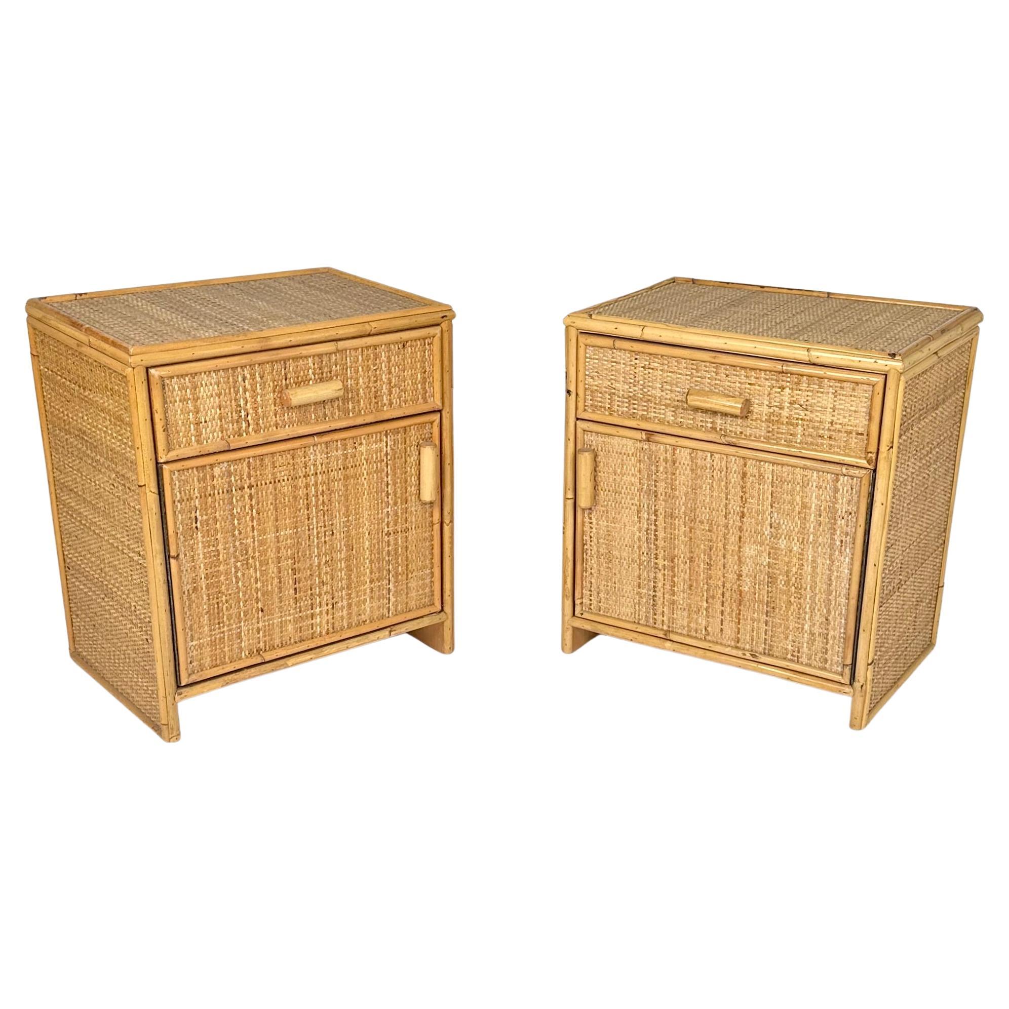 Midcentury pair of bed side table nightstands in bamboo and rattan with two drawer.

Made in Italy in the 1970s.