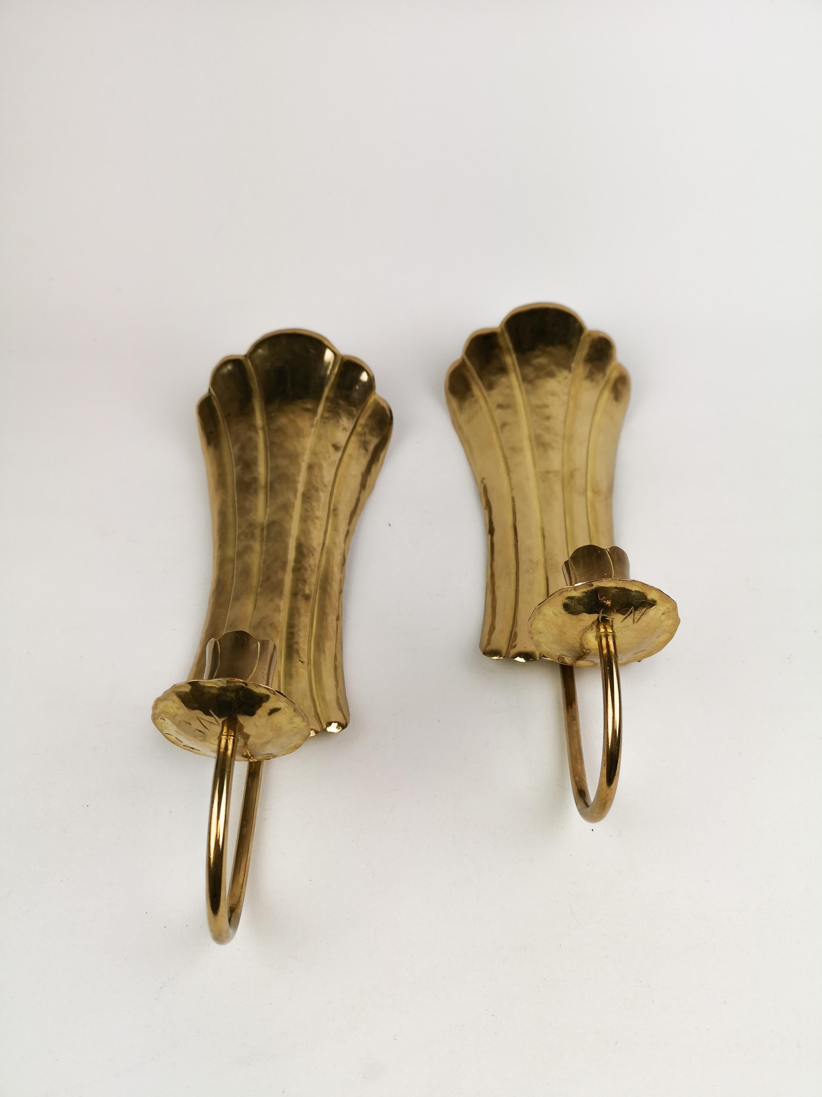 These wall candlesticks was hand sculpted in Arvika, Sweden. They are in the same shape and form as the candlesticks made in brass by famous Holmström Arvika, these ones has the initial of G.N.
Gives a nice shine when a candle is lit.

Nice