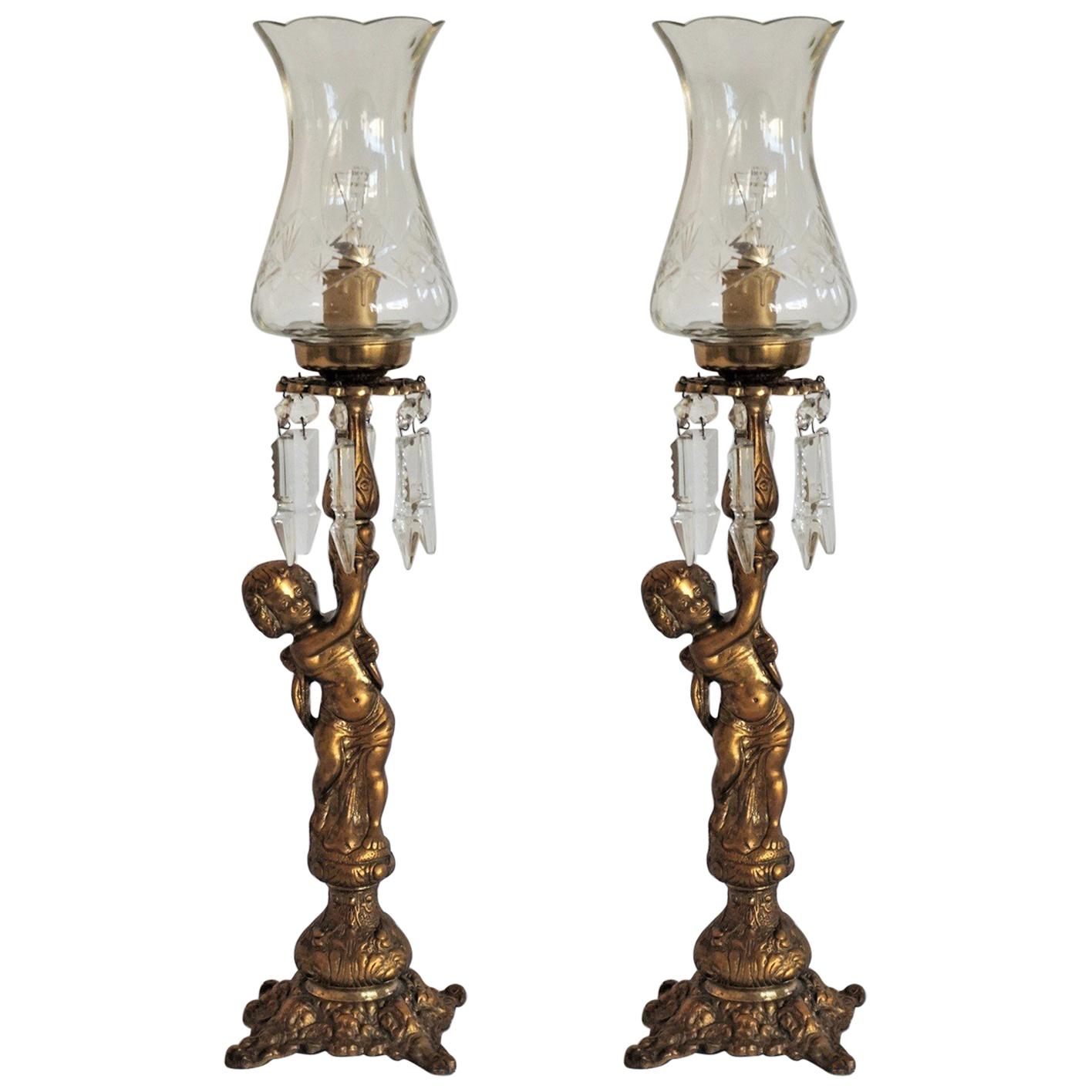 Midcentury Pair of Bronze Putti Table Lamps with Clear Cut Crystal Shades