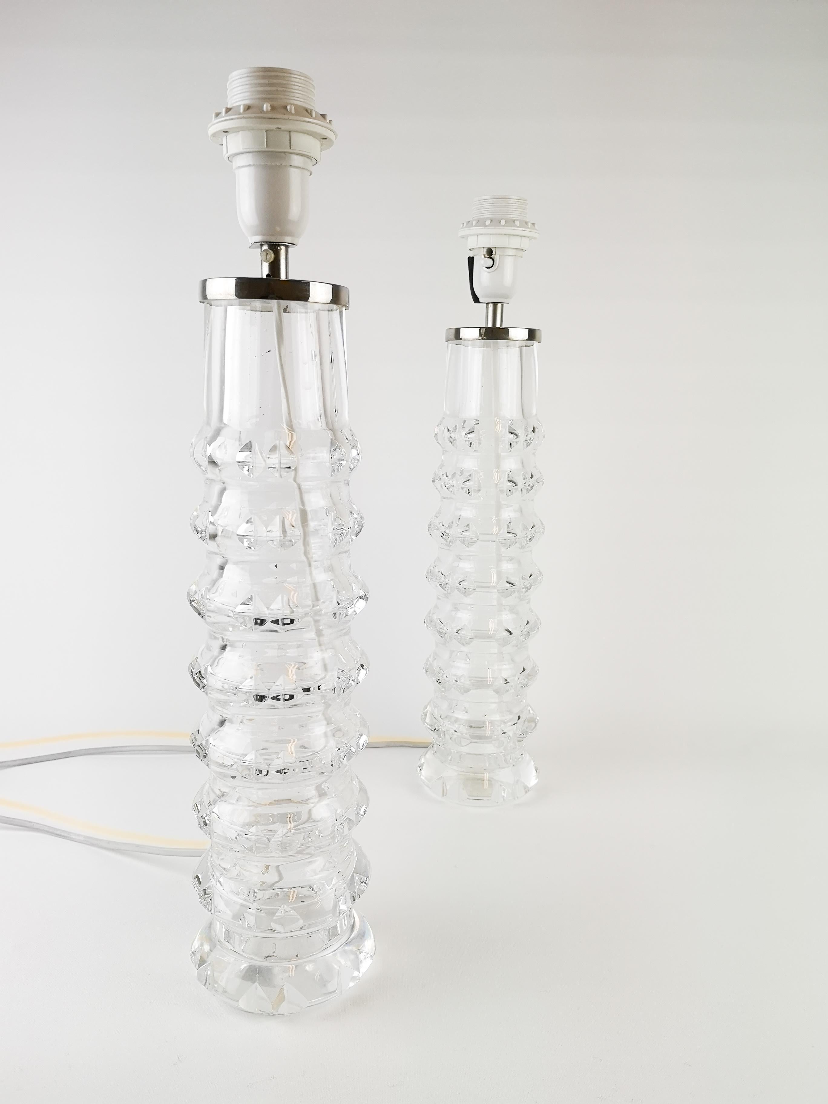 A pair of vintage table lamps designed by Carl Fagerlund for Orrefors, Sweden. Crystal glass. They are both signed in the bottom with Orrefors RD 207, circa 1970.

Nice condition, new wiring.


  