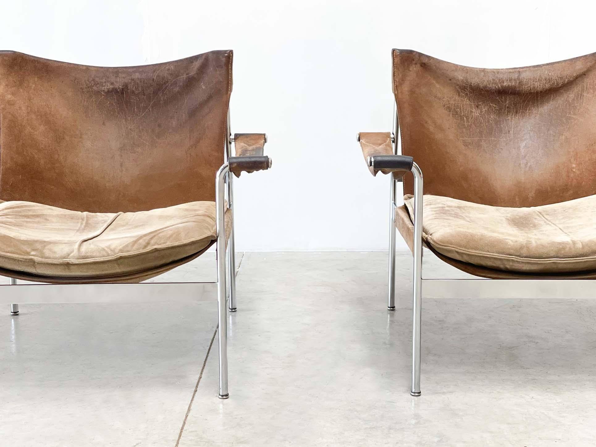 Amazing set of D99 lounge chairs with amazing patina. 

 

The set is made in germany by the well-known furniture company Tecta. The chairs are from 1965. They were designed by Hans Konecke, who also founded the company. 

 

The chairs are