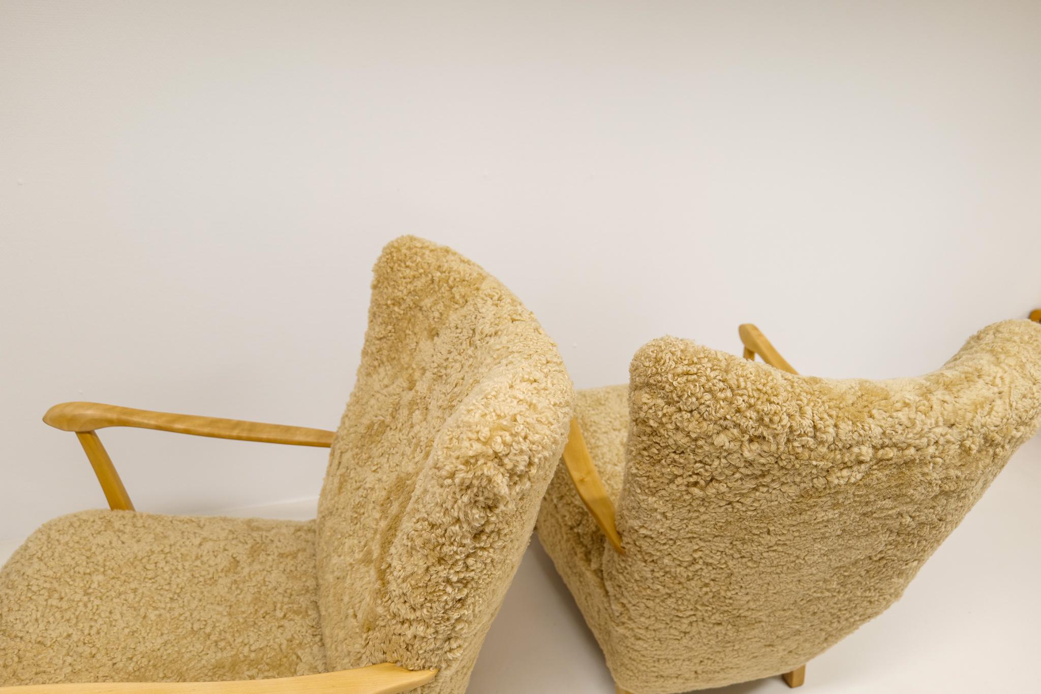 Midcentury Pair of Easy Chairs DUX in Sheepskin shearling, Sweden, 1950s 4