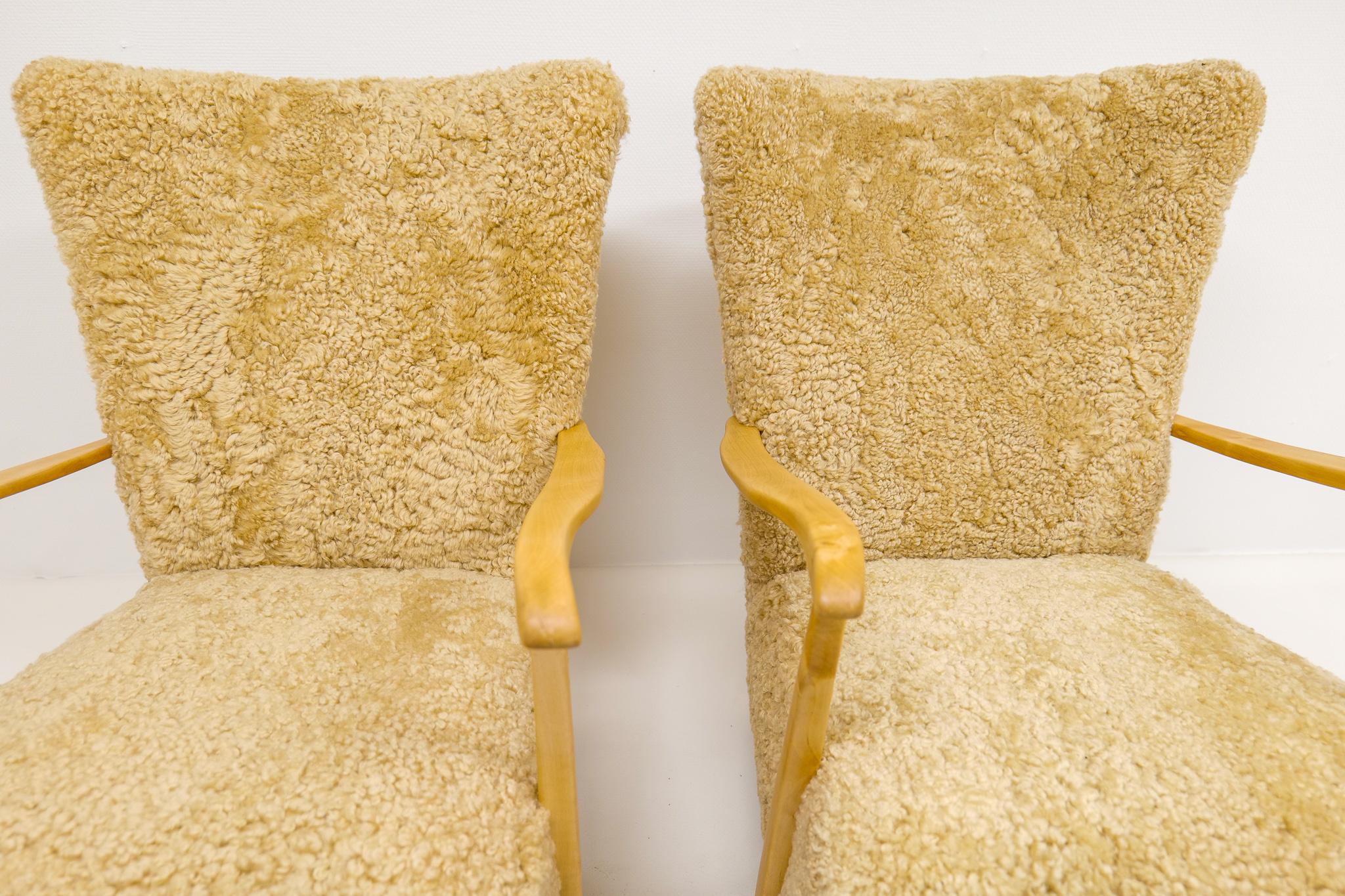 Midcentury Pair of Easy Chairs DUX in Sheepskin shearling, Sweden, 1950s 11