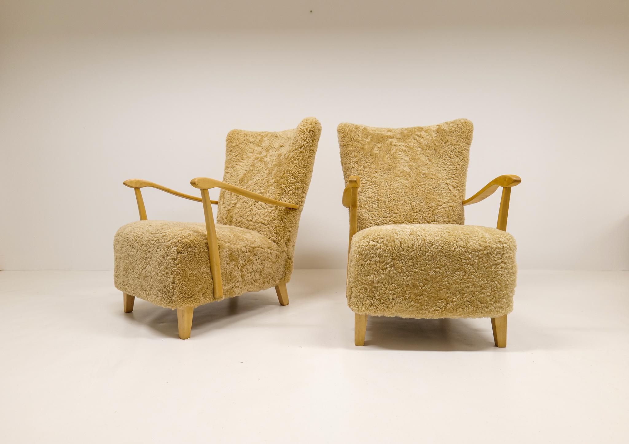 Mid-Century Modern Midcentury Pair of Easy Chairs DUX in Sheepskin shearling, Sweden, 1950s