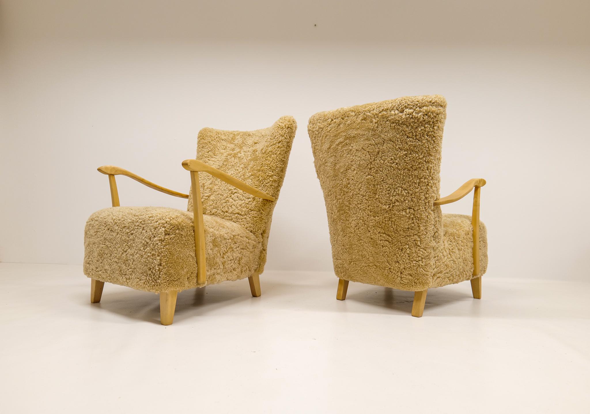 Mid-20th Century Midcentury Pair of Easy Chairs DUX in Sheepskin shearling, Sweden, 1950s
