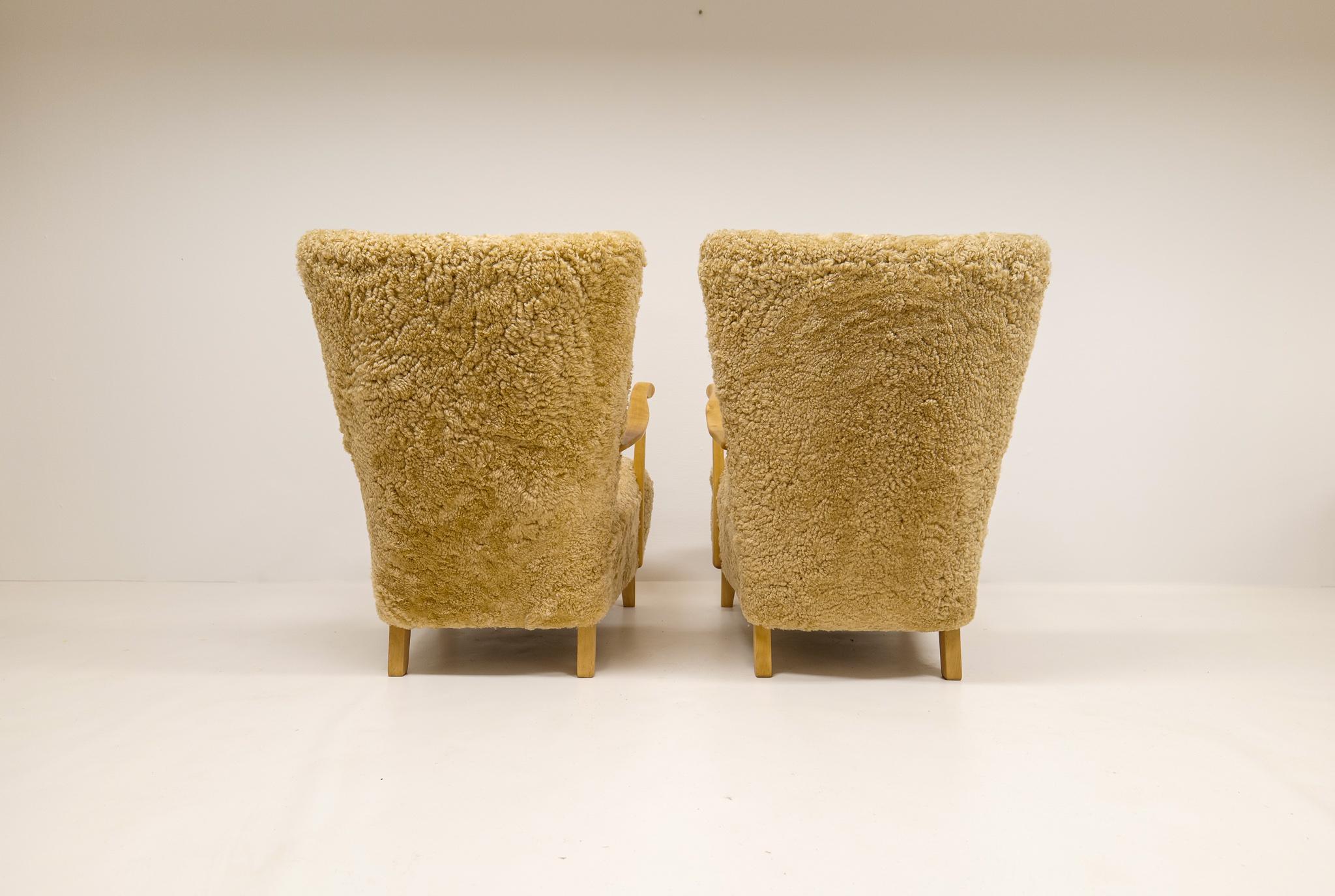 Midcentury Pair of Easy Chairs DUX in Sheepskin shearling, Sweden, 1950s 2