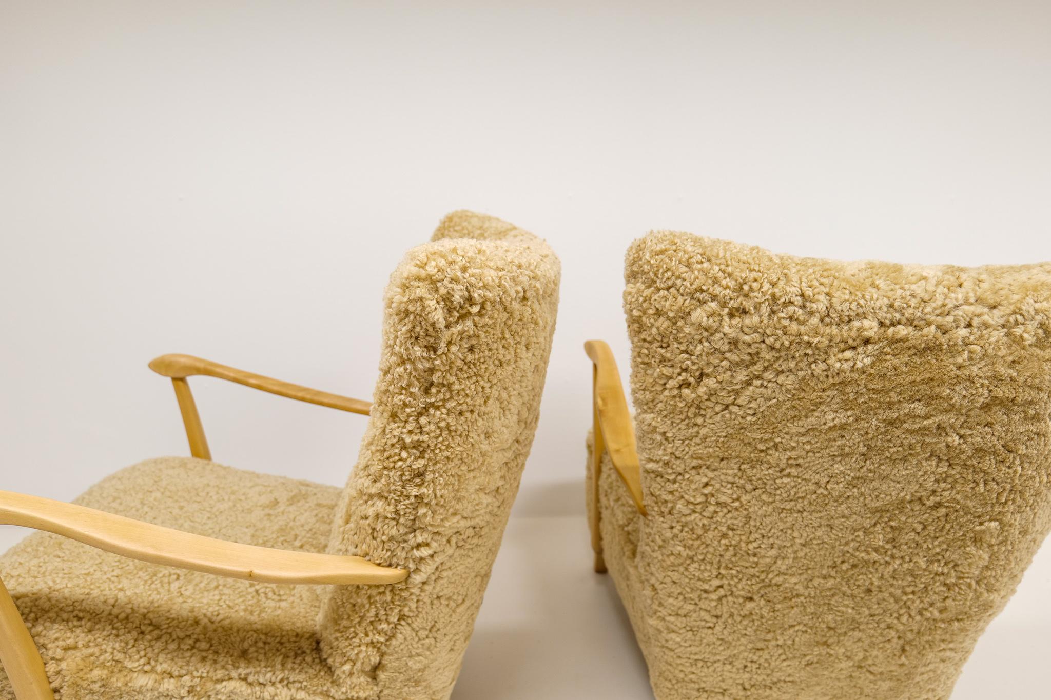 Midcentury Pair of Easy Chairs DUX in Sheepskin shearling, Sweden, 1950s 3