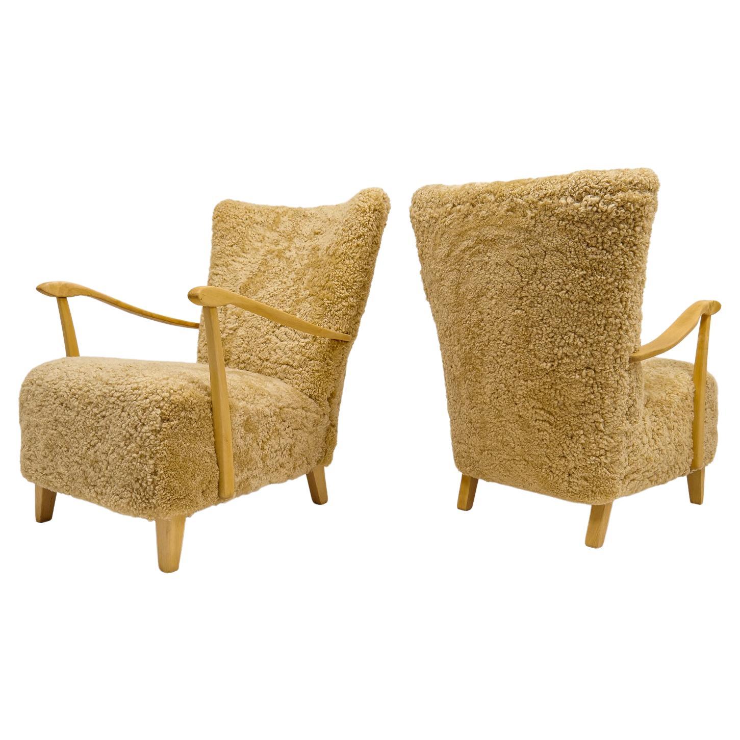 Midcentury Pair of Easy Chairs DUX in Sheepskin shearling, Sweden, 1950s