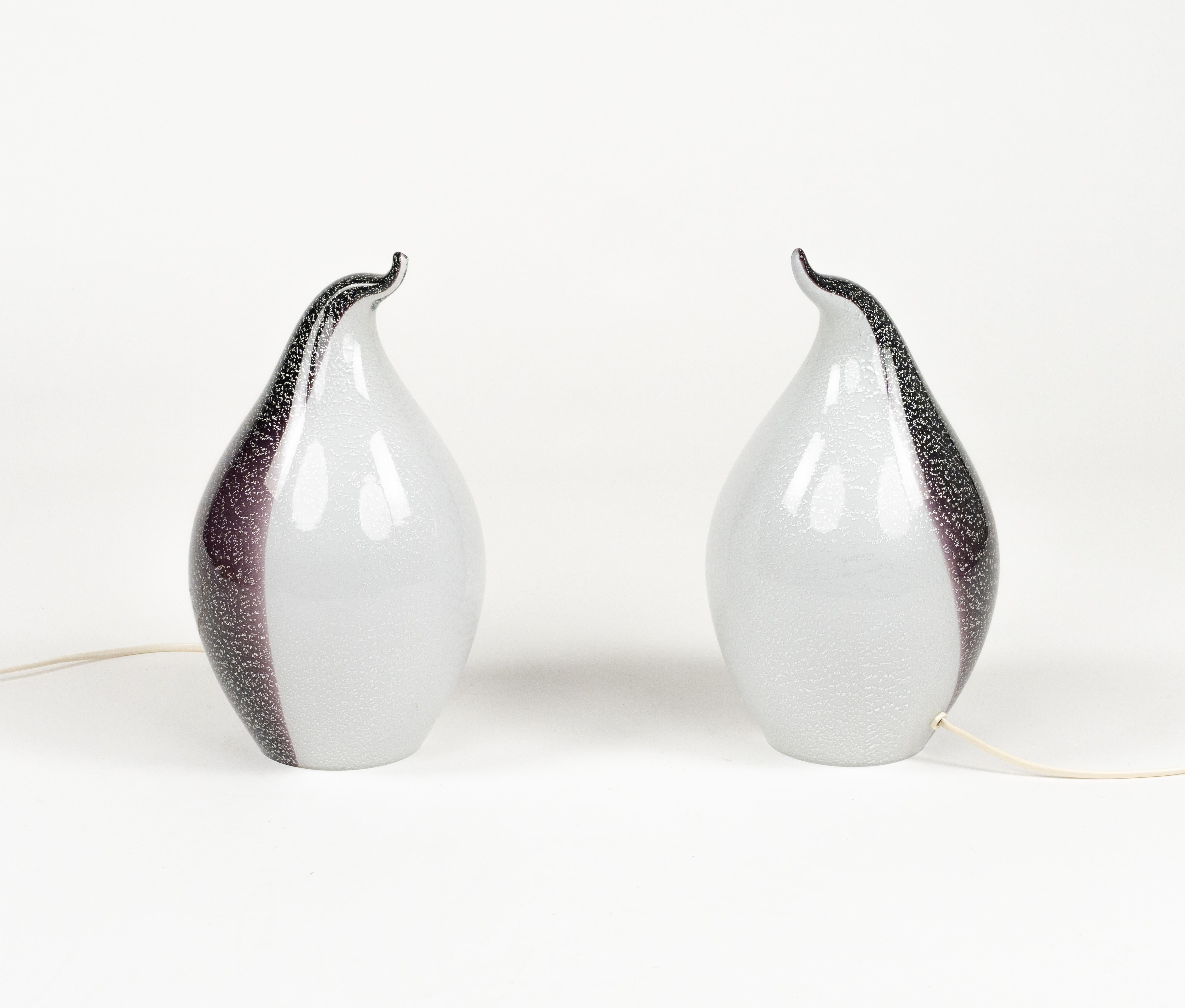 Midcentury amazing pair of table lamps shape of penguin black and white blown murano glass with silver leaf.

Made in Italy in the 1970s.

