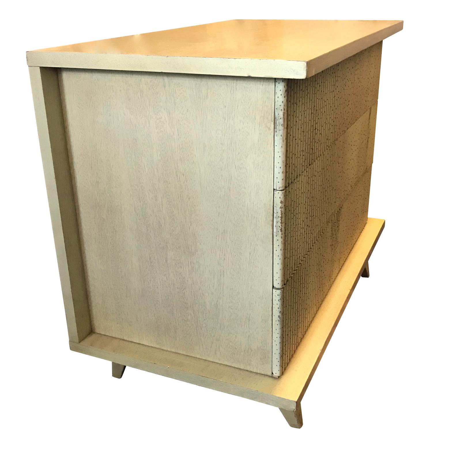 Pair midcentury textured rib front three-drawer commodes.
Clean front, hardware free.
Smooth recessed sides.
Tapered legs.
Sycamore.