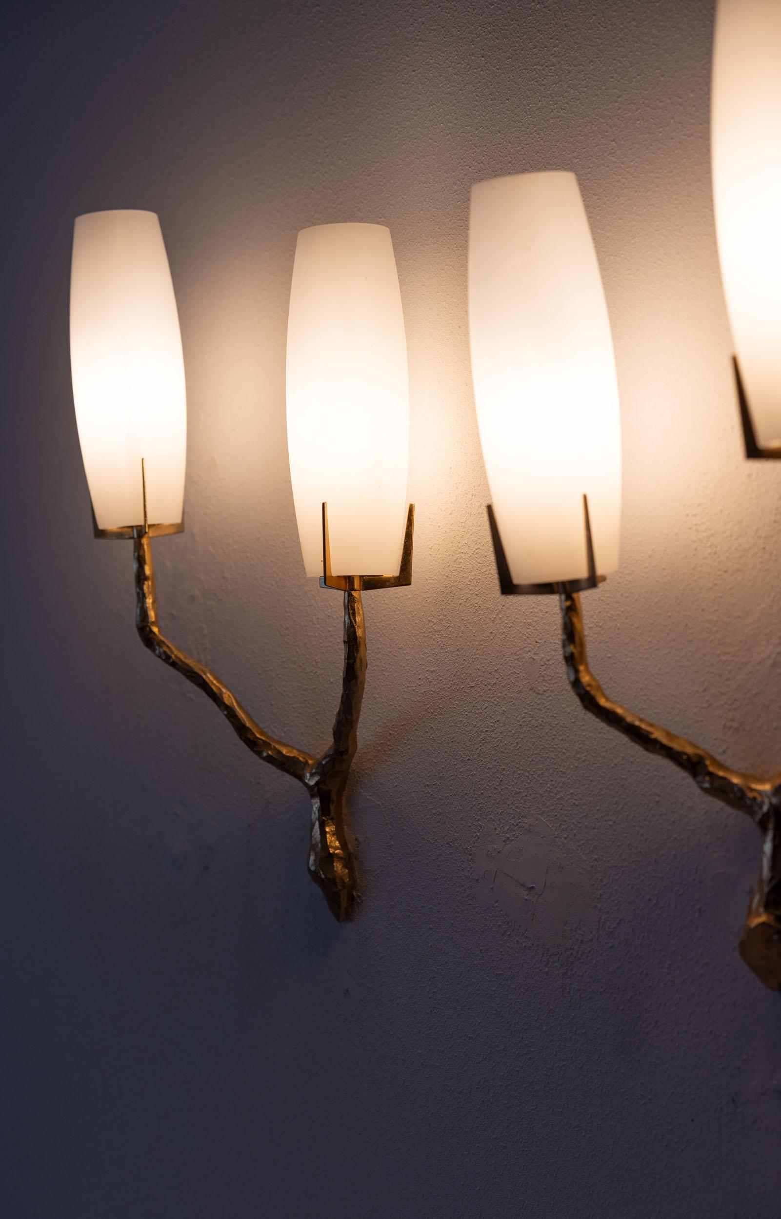 Brass Midcentury pair of wall lights by Maison Arlus, France 1960 For Sale