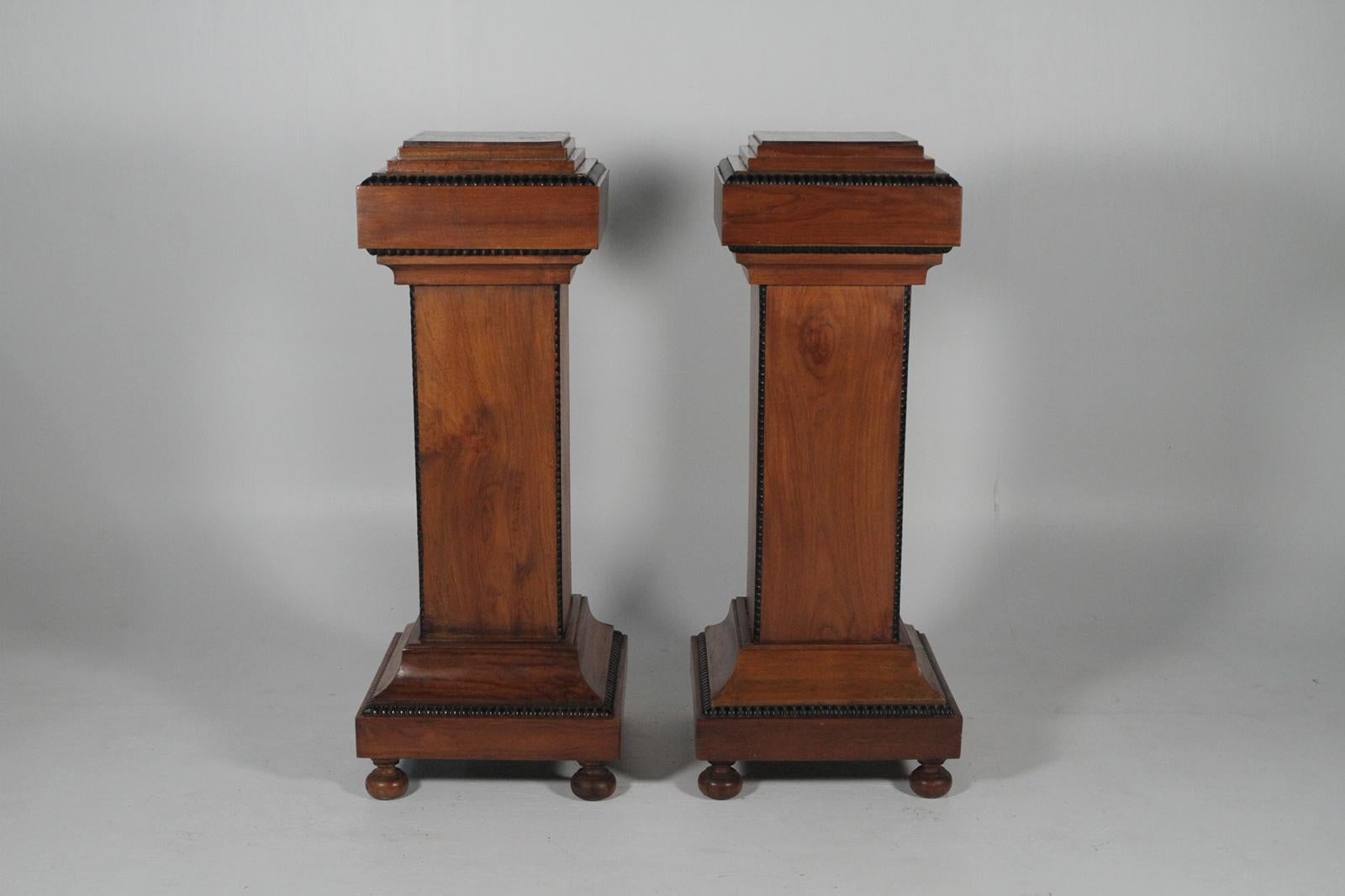 Midcentury pair of walnut wood pedestals with ebonized highlights
Dimensions: 44”H x 17.5