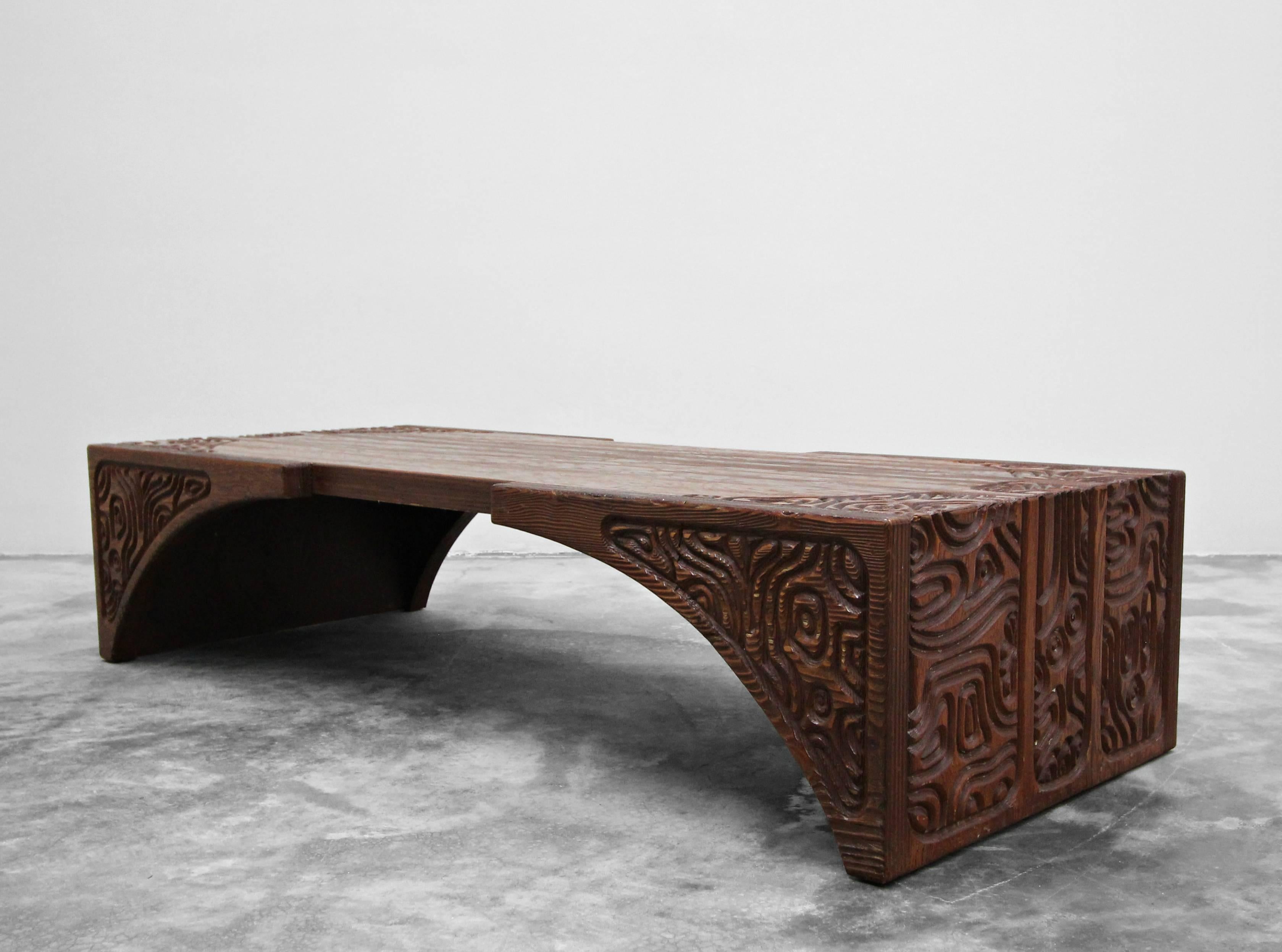 There are no words.

This table is a design masterpieces. With intricate and intriguing carved wood details, unique, eclectic pieces. Lending itself to designs by Everlyn Ackerman and Murray Feldman.

Would also make an amazing bench.

This