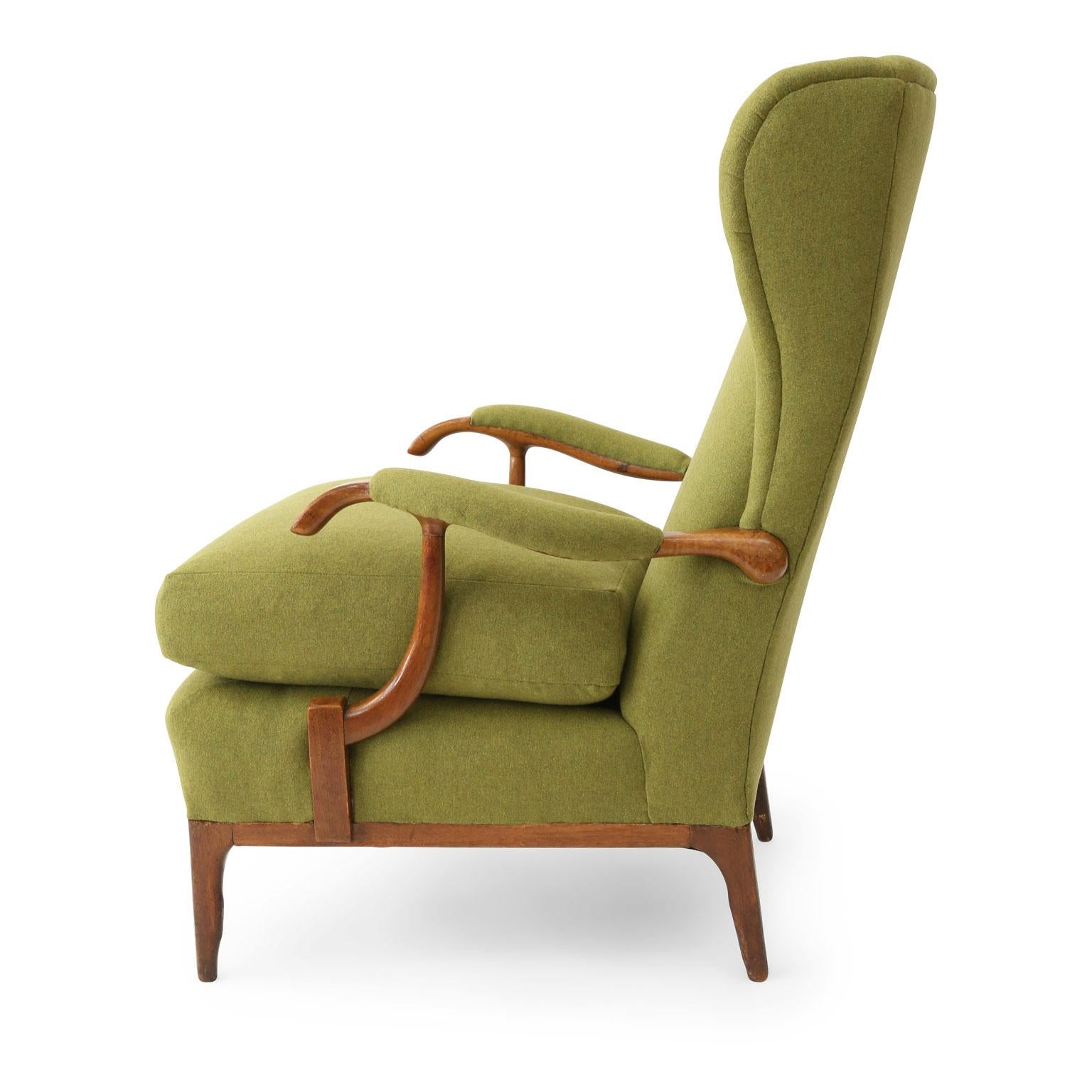 Midcentury Paolo Buffa lounge chair by Framar, circa 1950s. Sturdy walnut Italian wingback frame newly-reupholstered in a fine green wool with a down-wrap seat cushion.
 